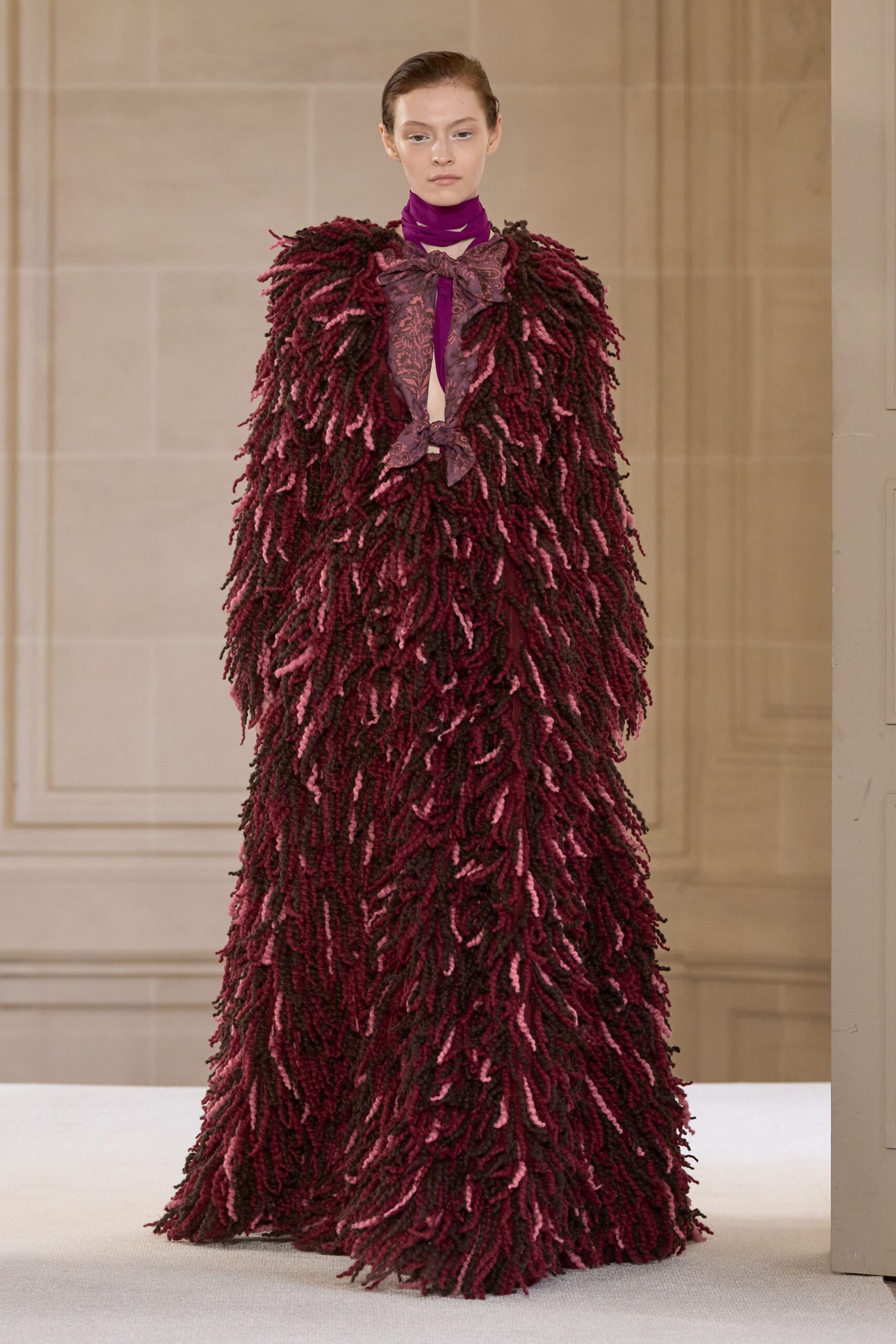 fringed red and purple gown