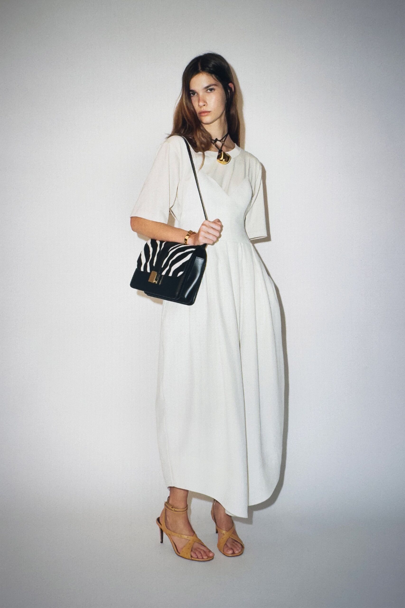 white relaxed midi dress with strappy shoes