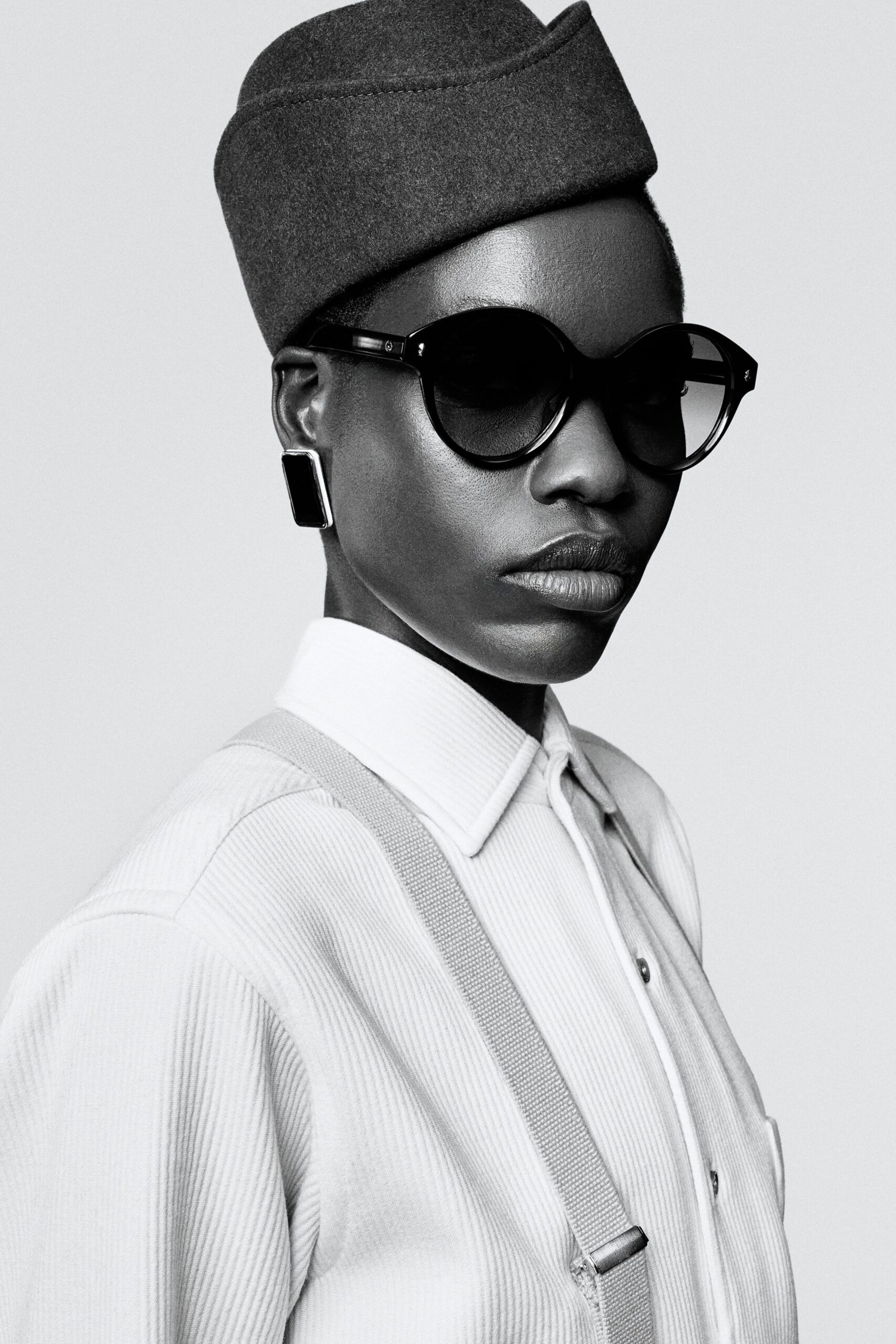 fitted white shirt with gray hat