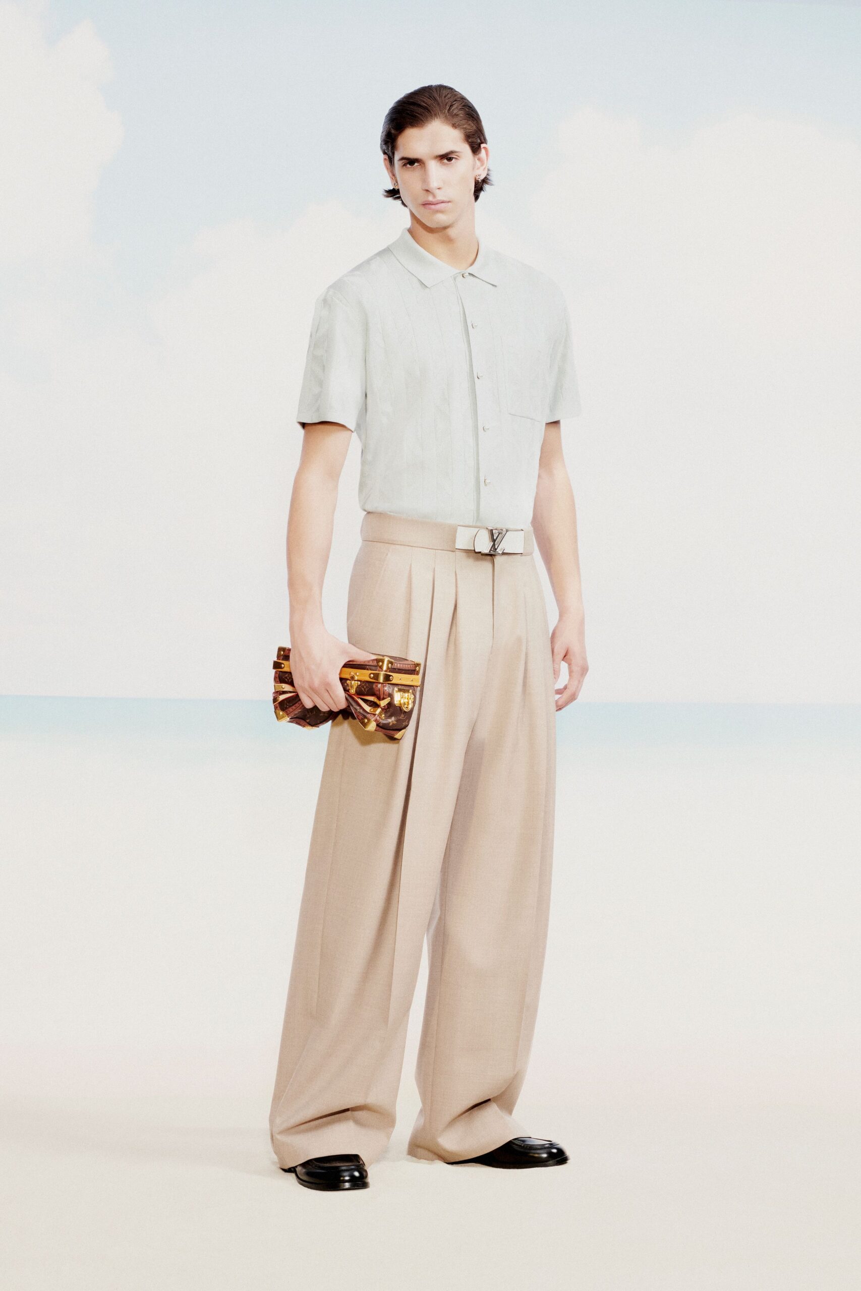 light blue shirt beige pants