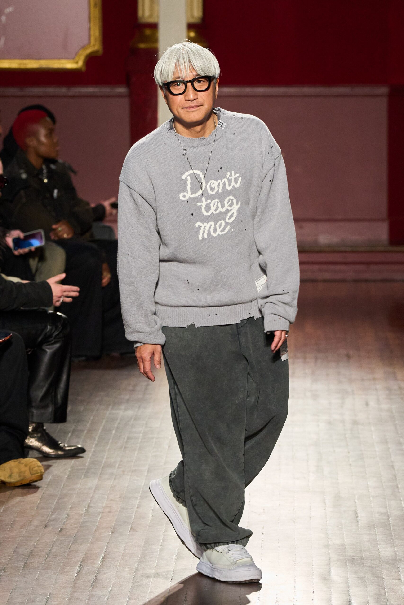 gray relaxed sweater with black pants