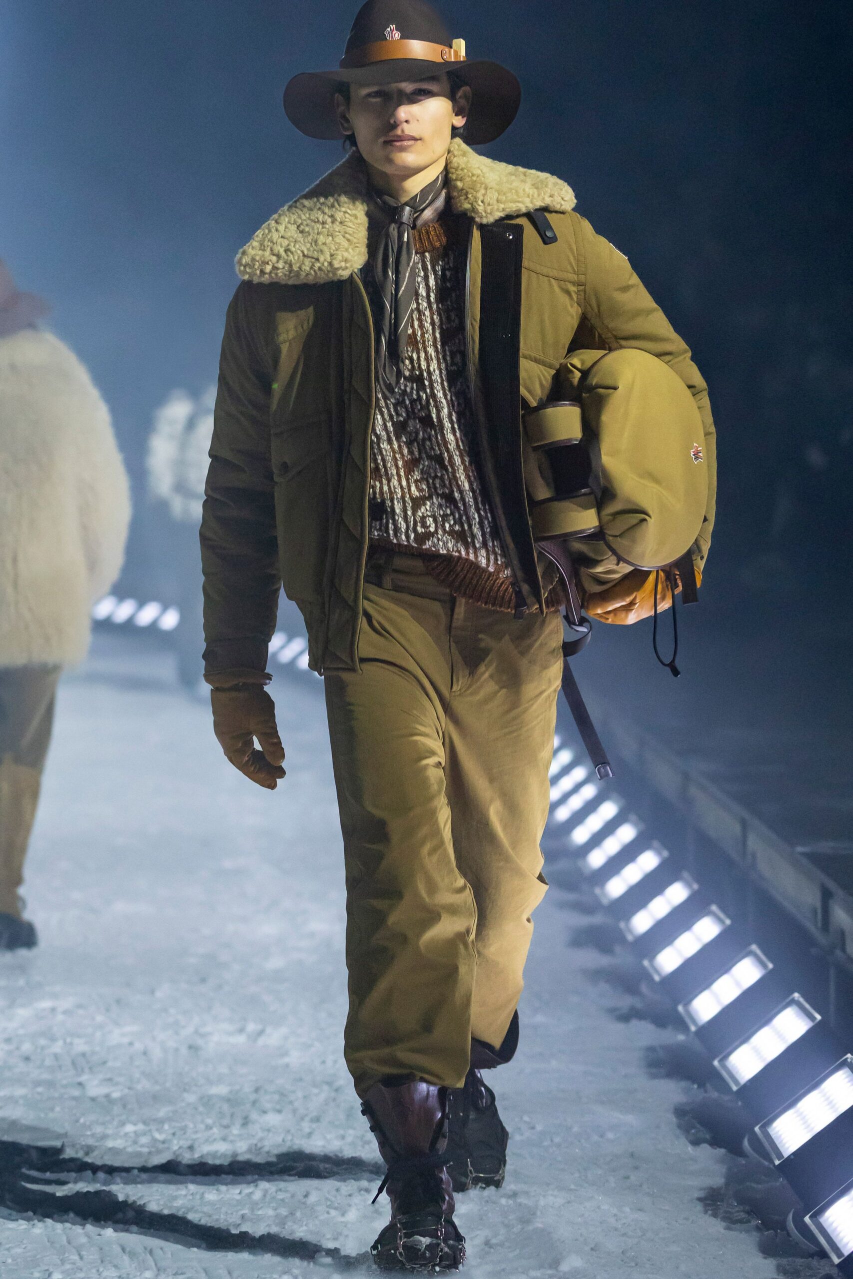 brown jacket with beige pants