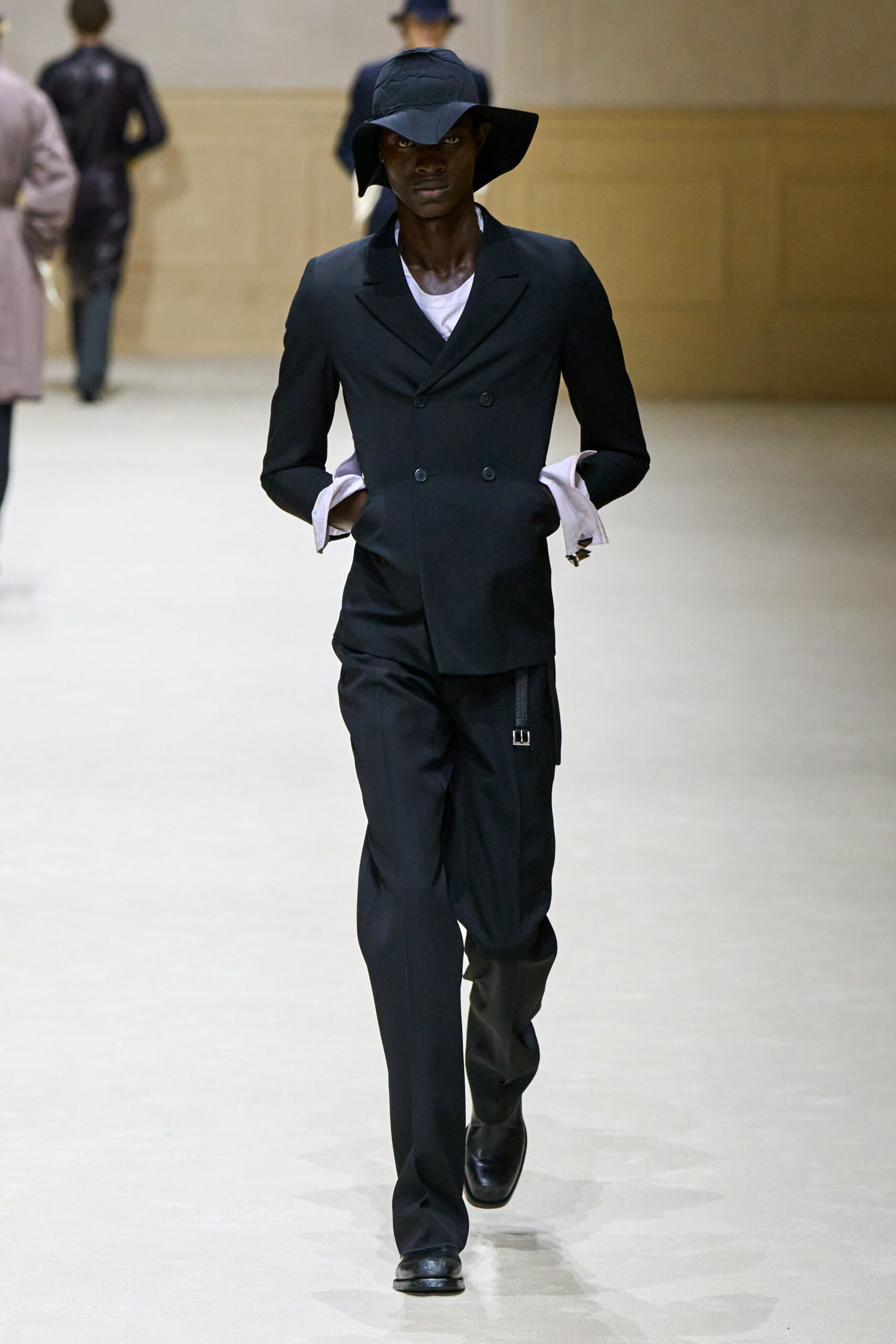 black tailored suit with white shirt