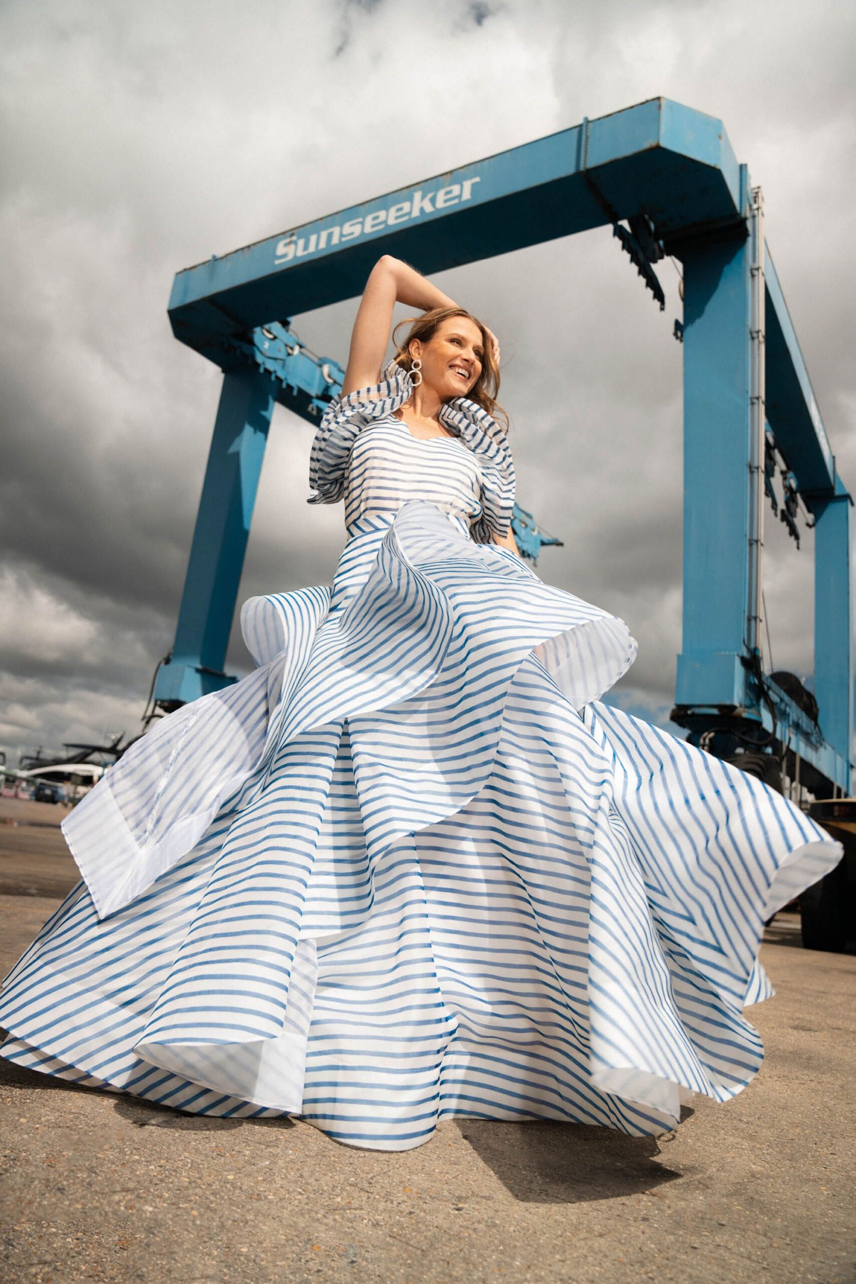 striped white and blue gown with jacket