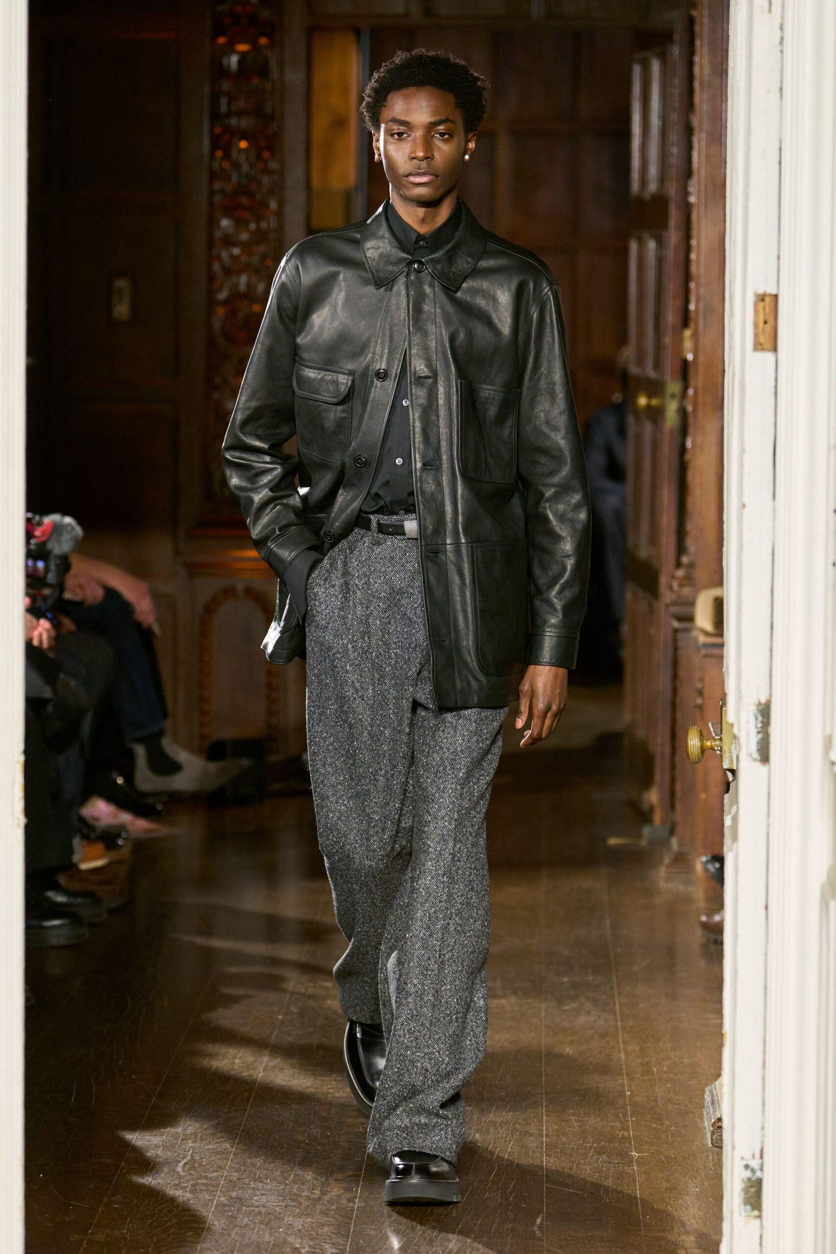 black leather jacket gray pants