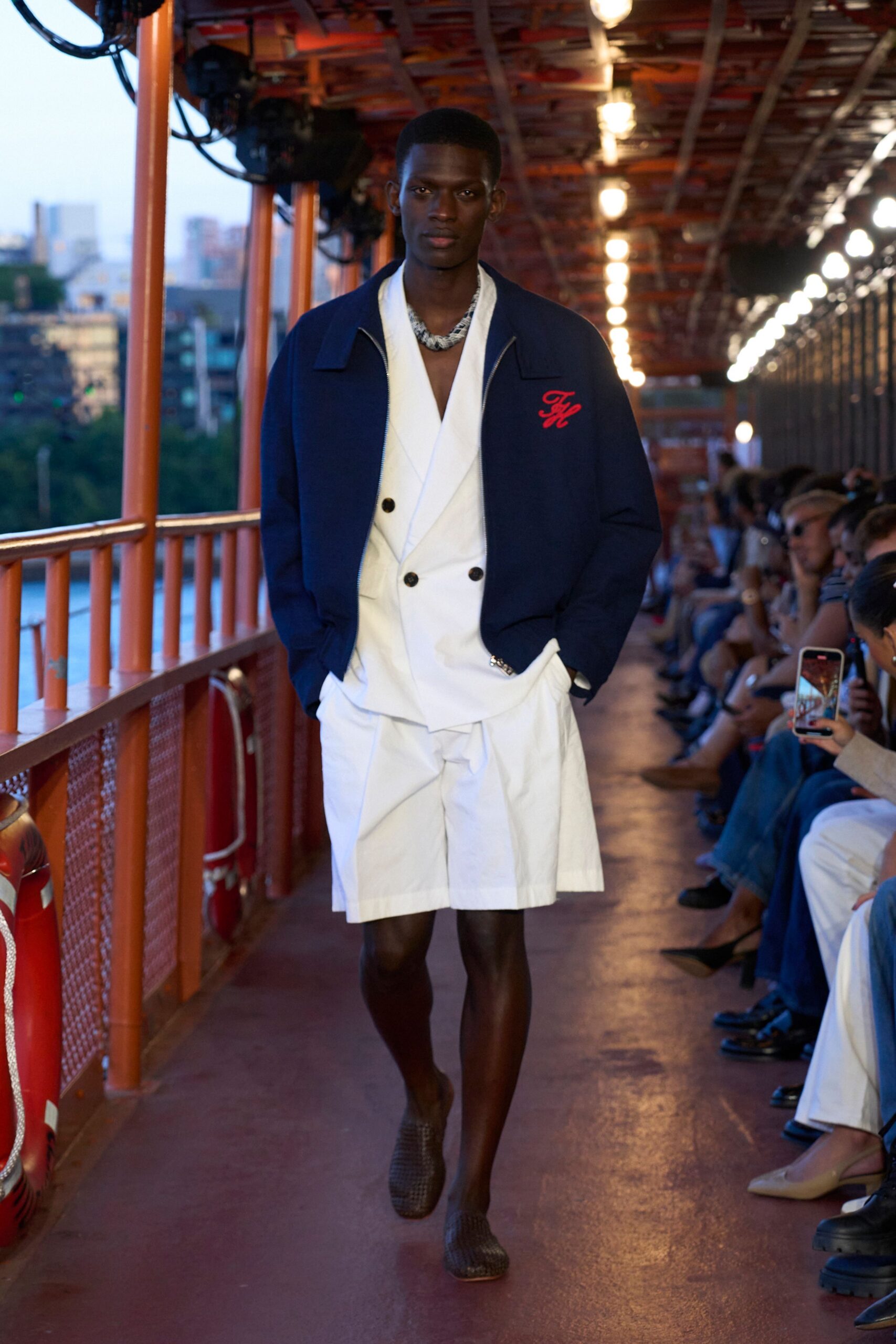 navy jacket white shirt shorts