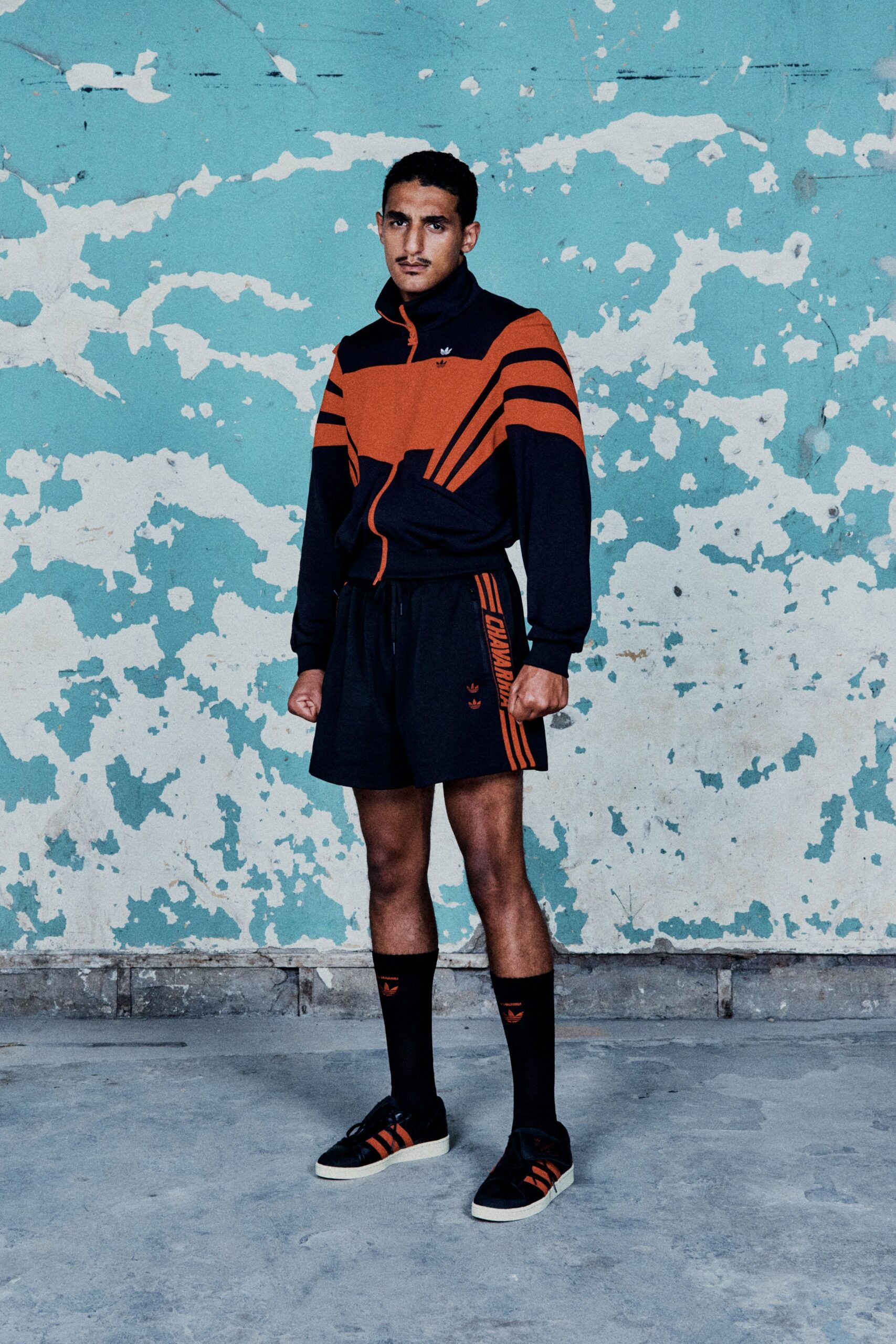 black and orange athletic outfit