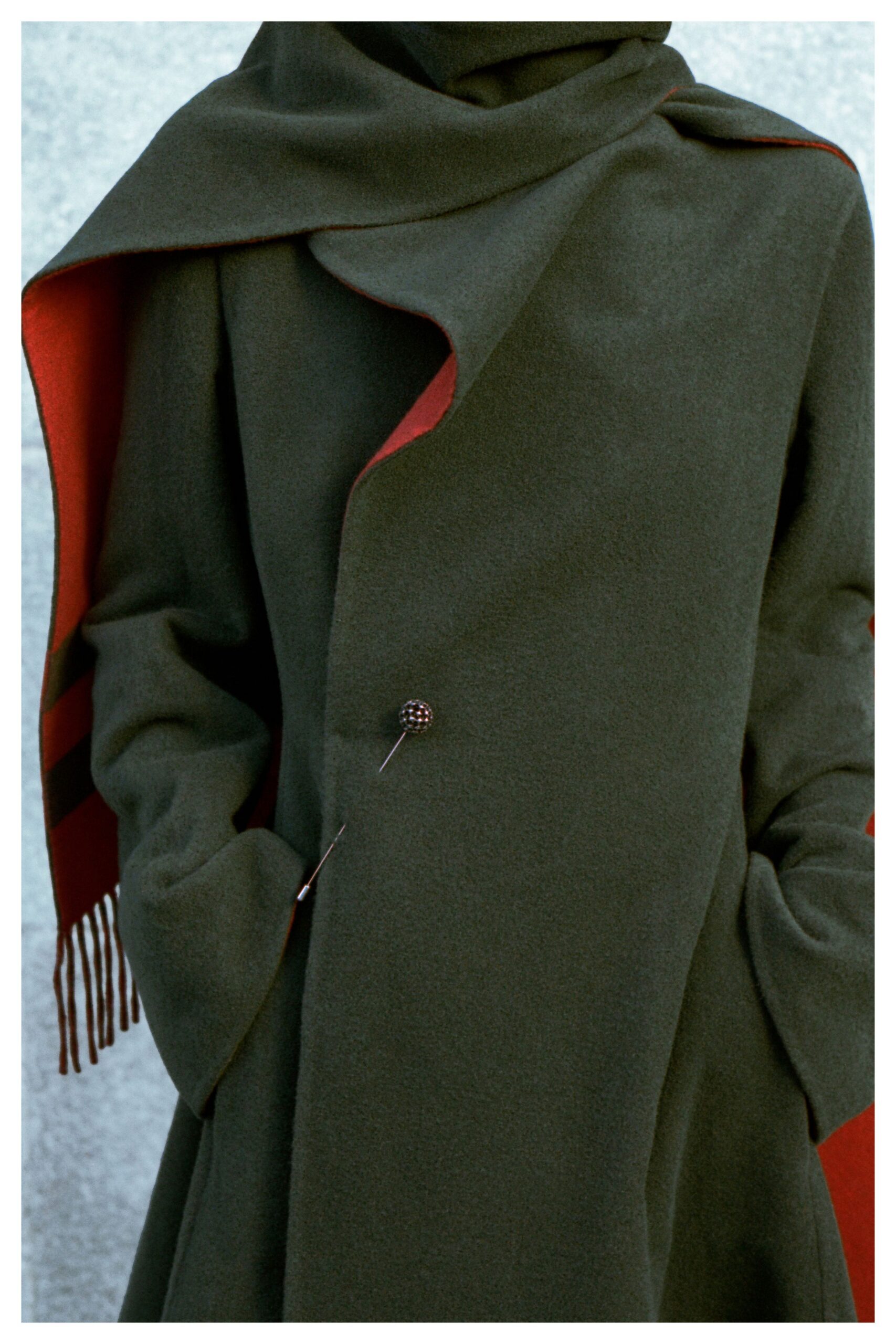 green wool long-sleeve collared relaxed layered buttoned coat