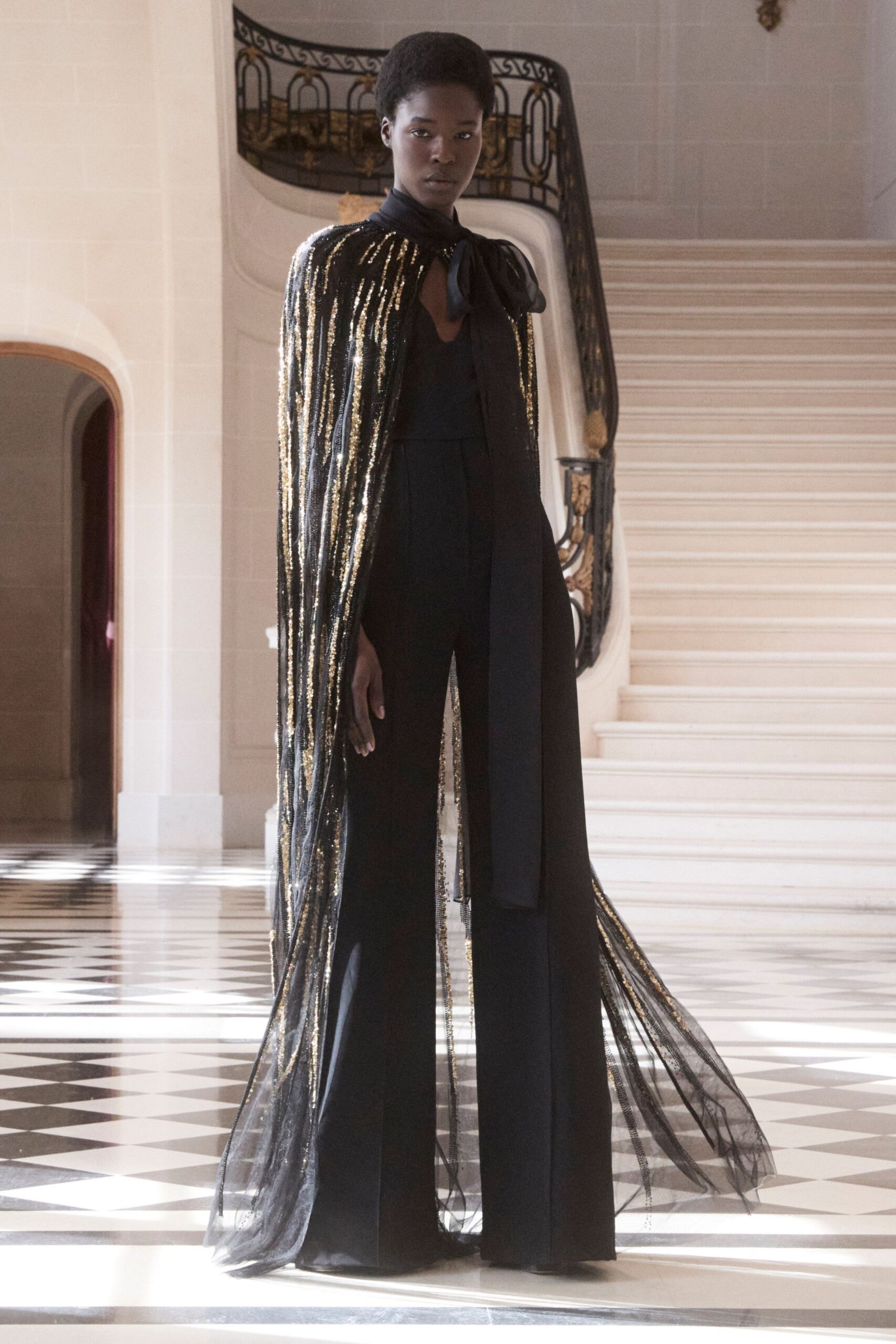 black silk jumpsuit with cape