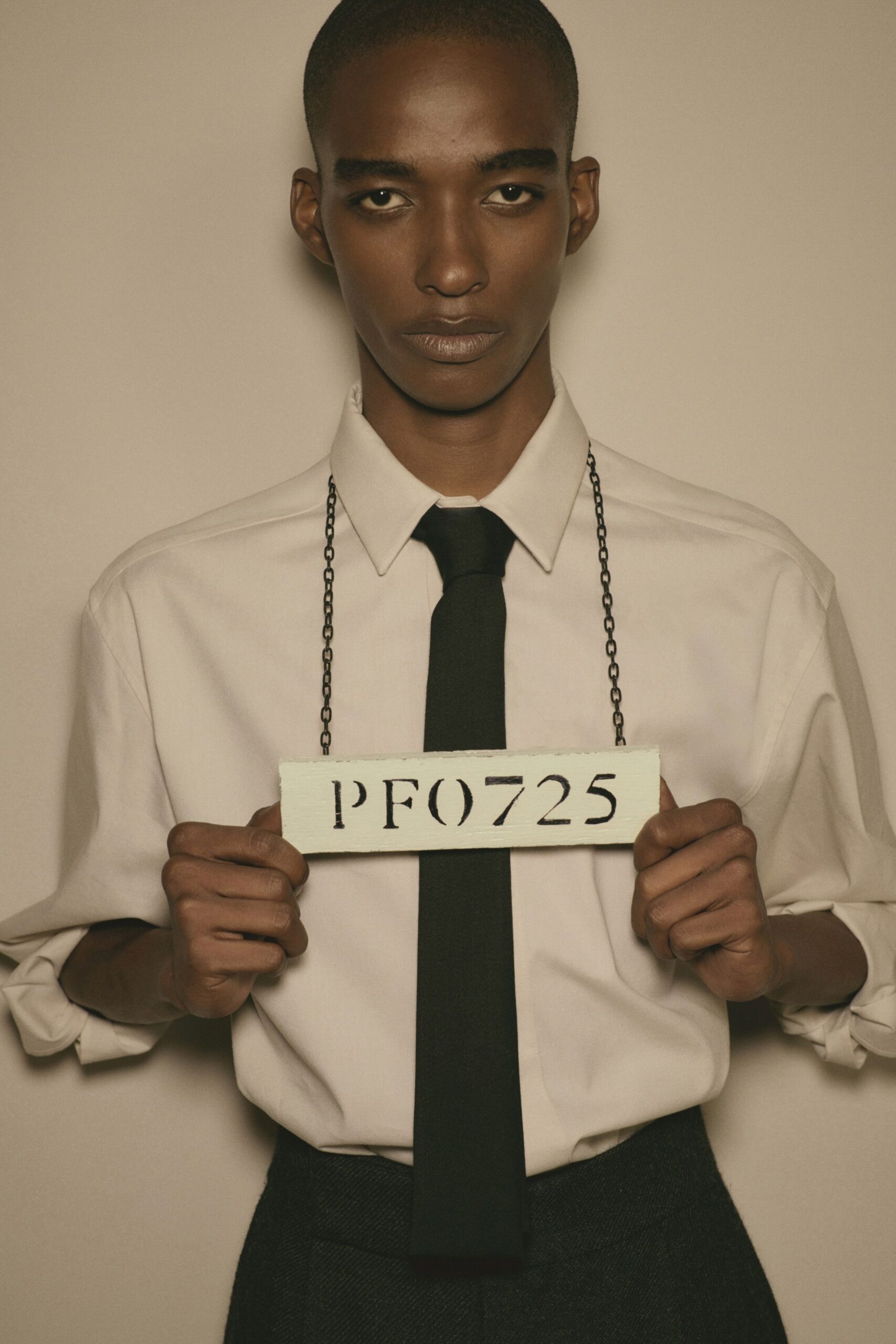 white fitted shirt with black tie