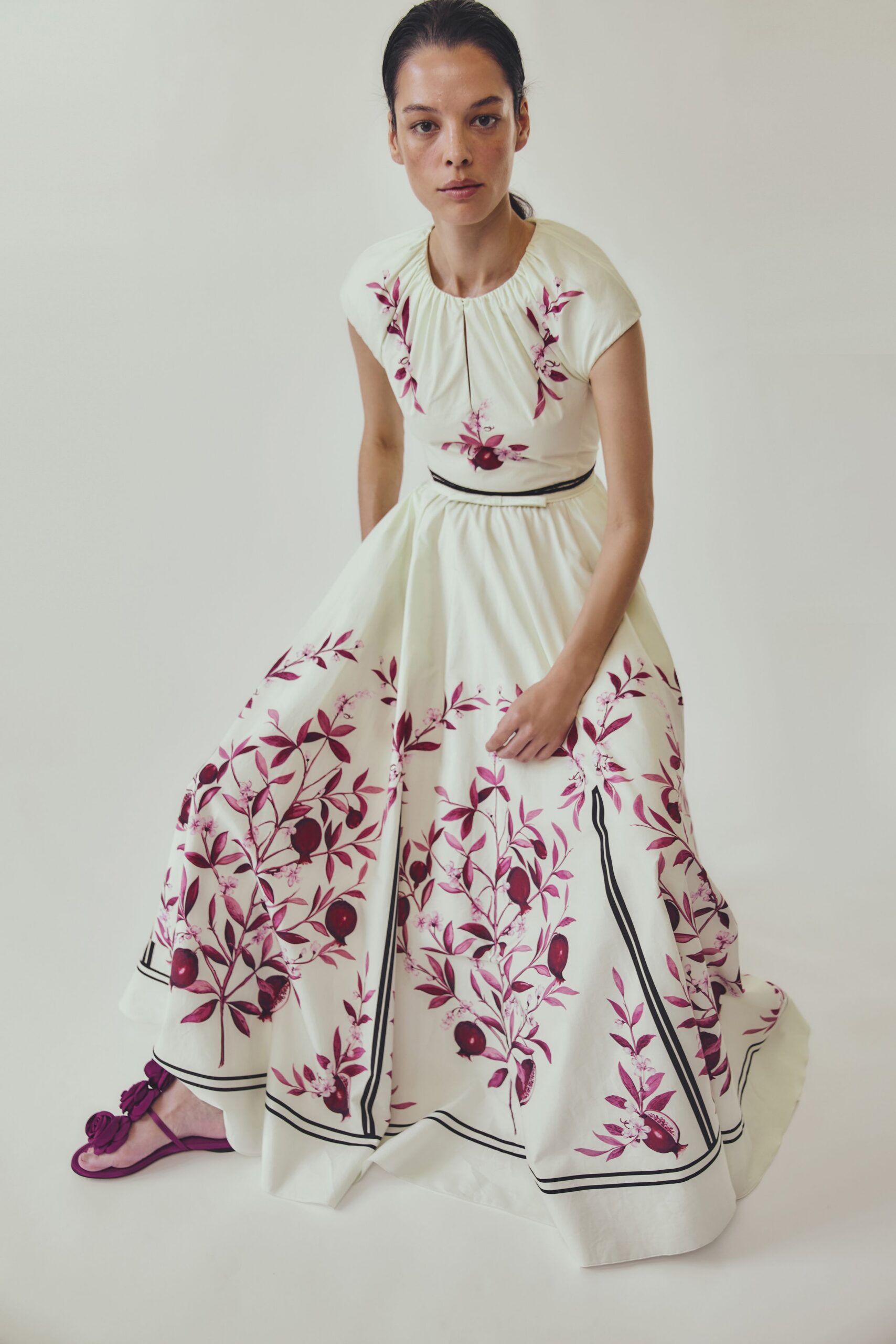 white embroidered maxi gown with pink shoes