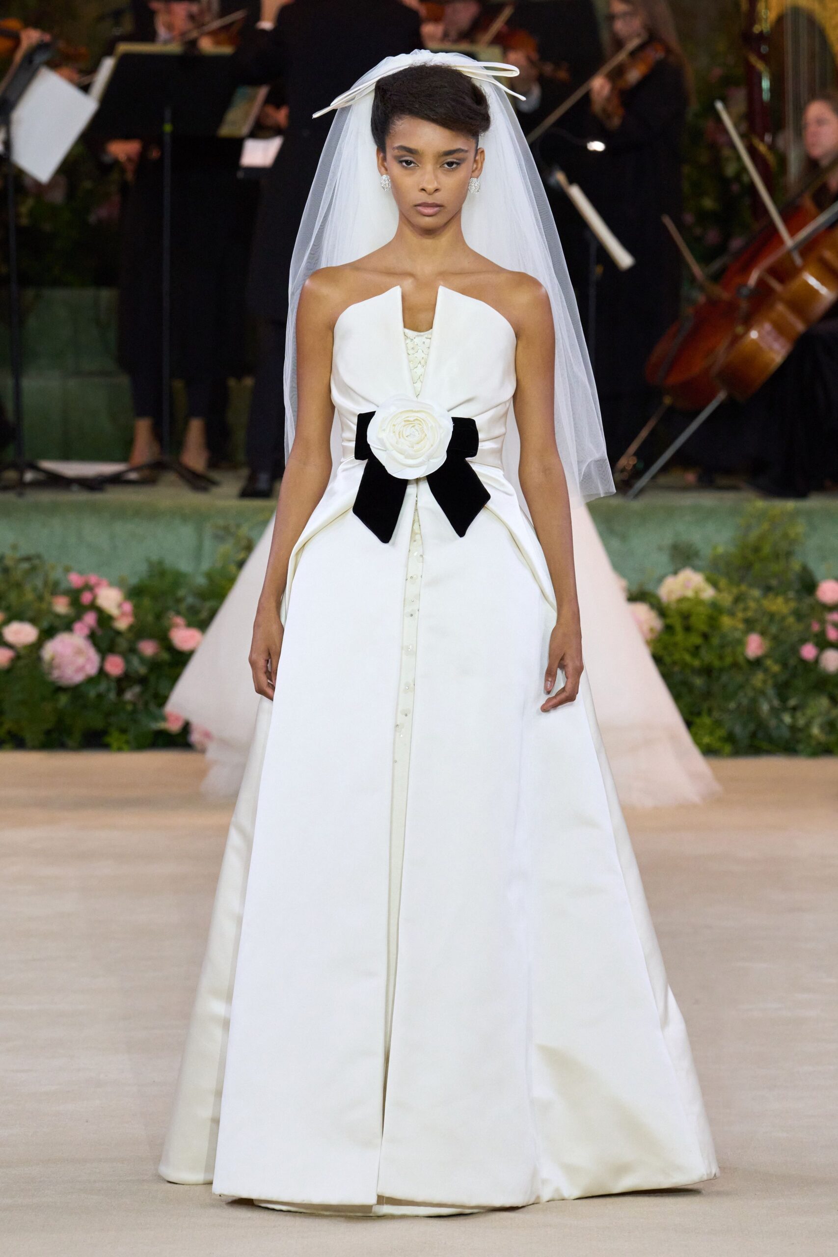 white silk strapless gown