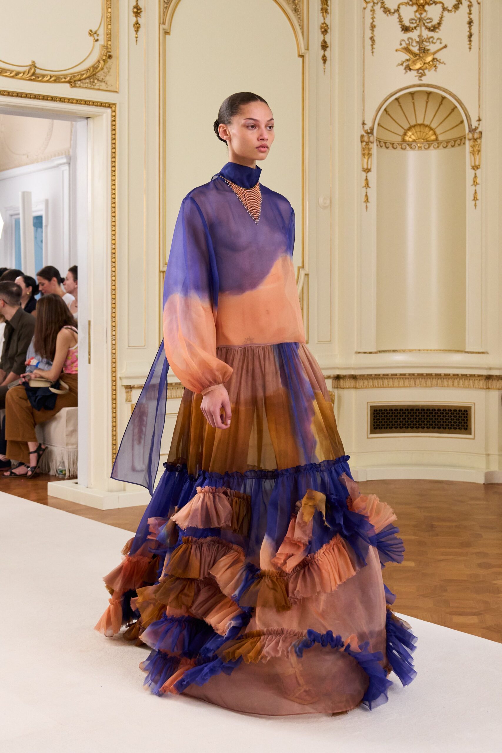 orange and blue flowing gown
