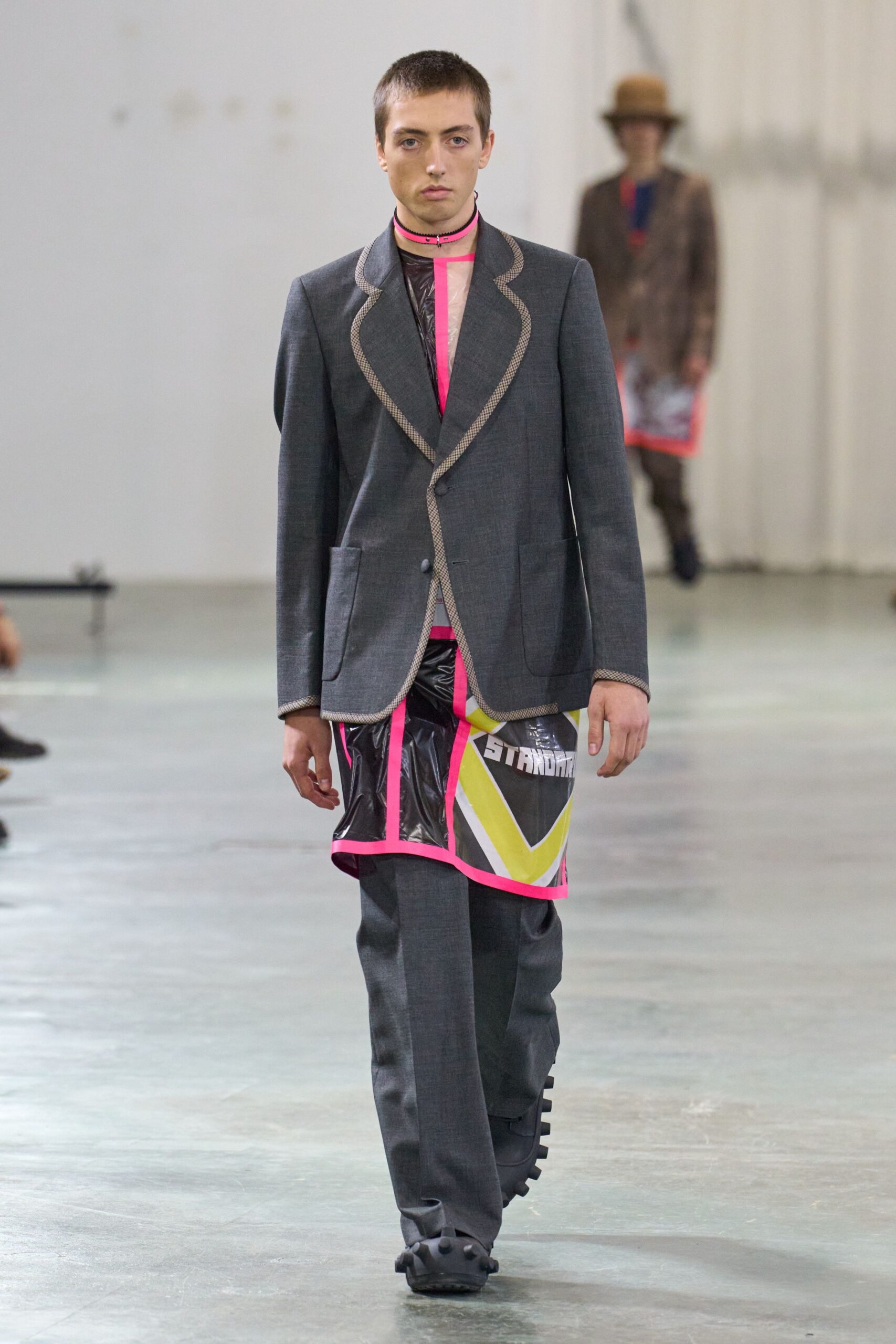 gray tailored suit with pink shirt