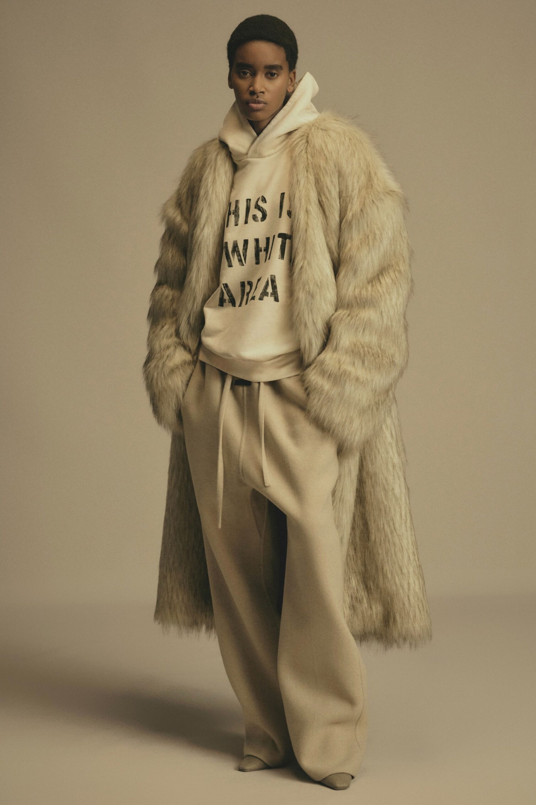 beige faux-fur coat with hoodie