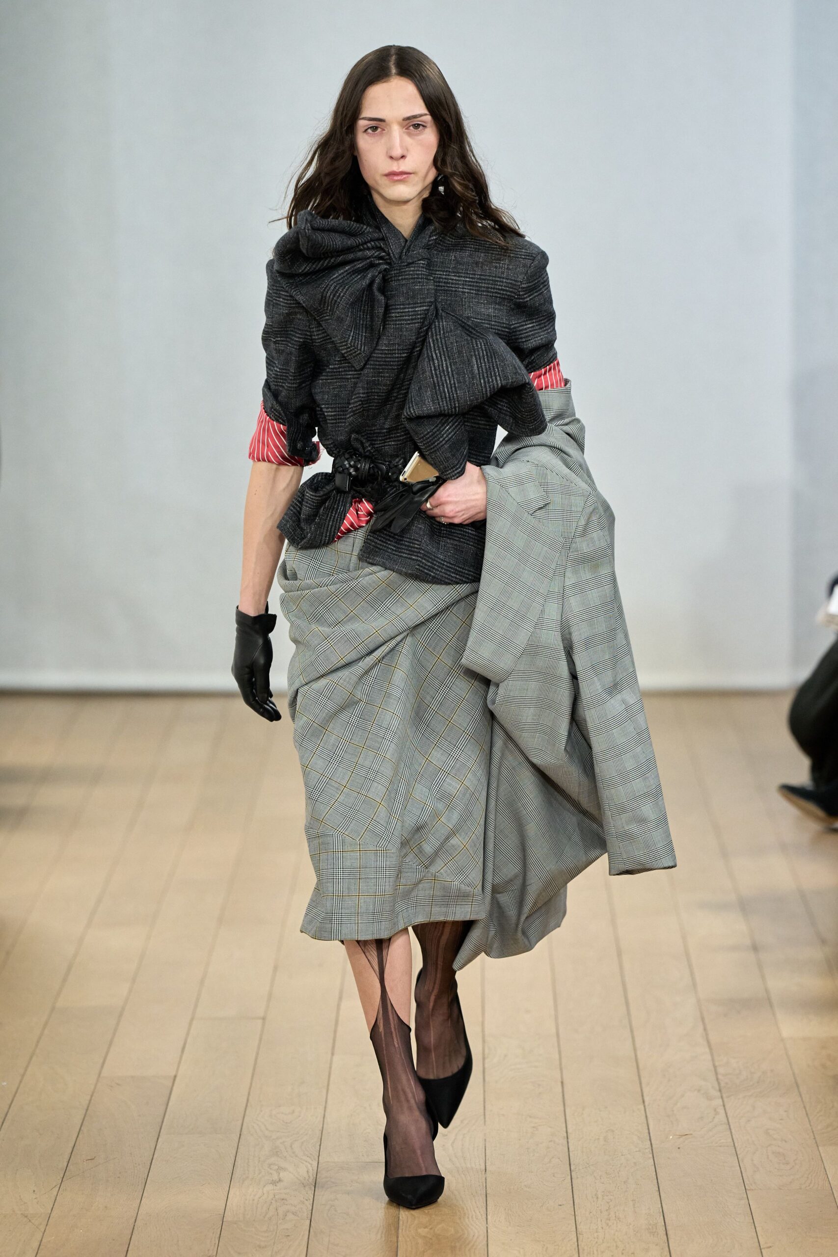 red fitted shirt gray pleated skirt