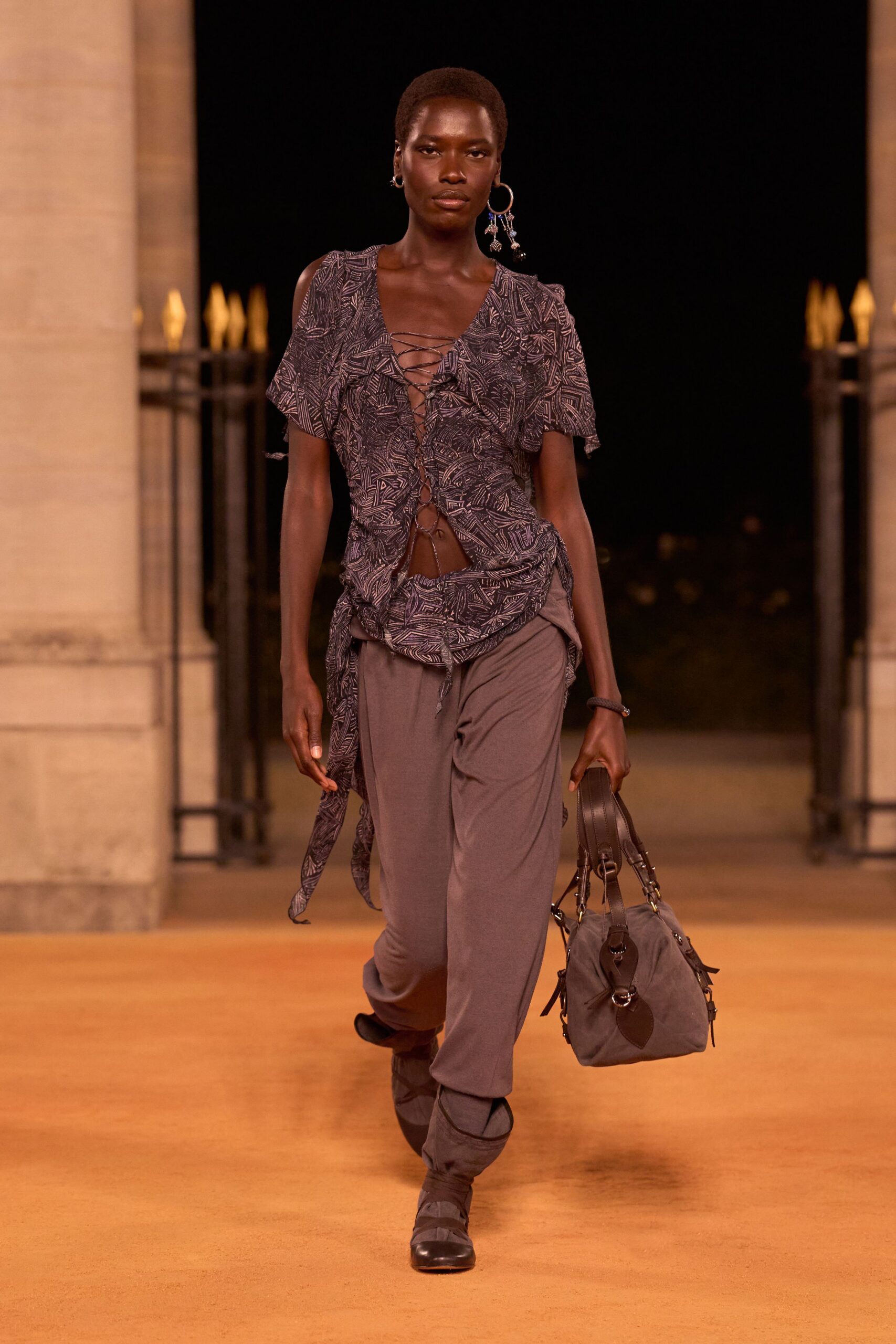 blue embroidered top gray pants