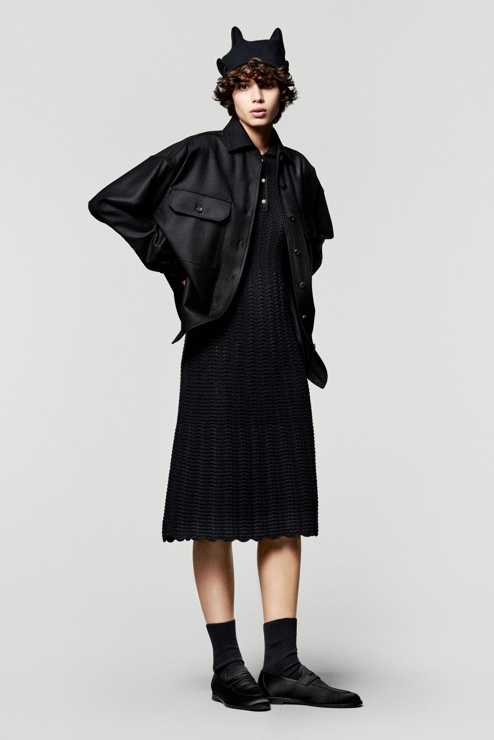 black leather long-sleeve collared relaxed buttoned jacket