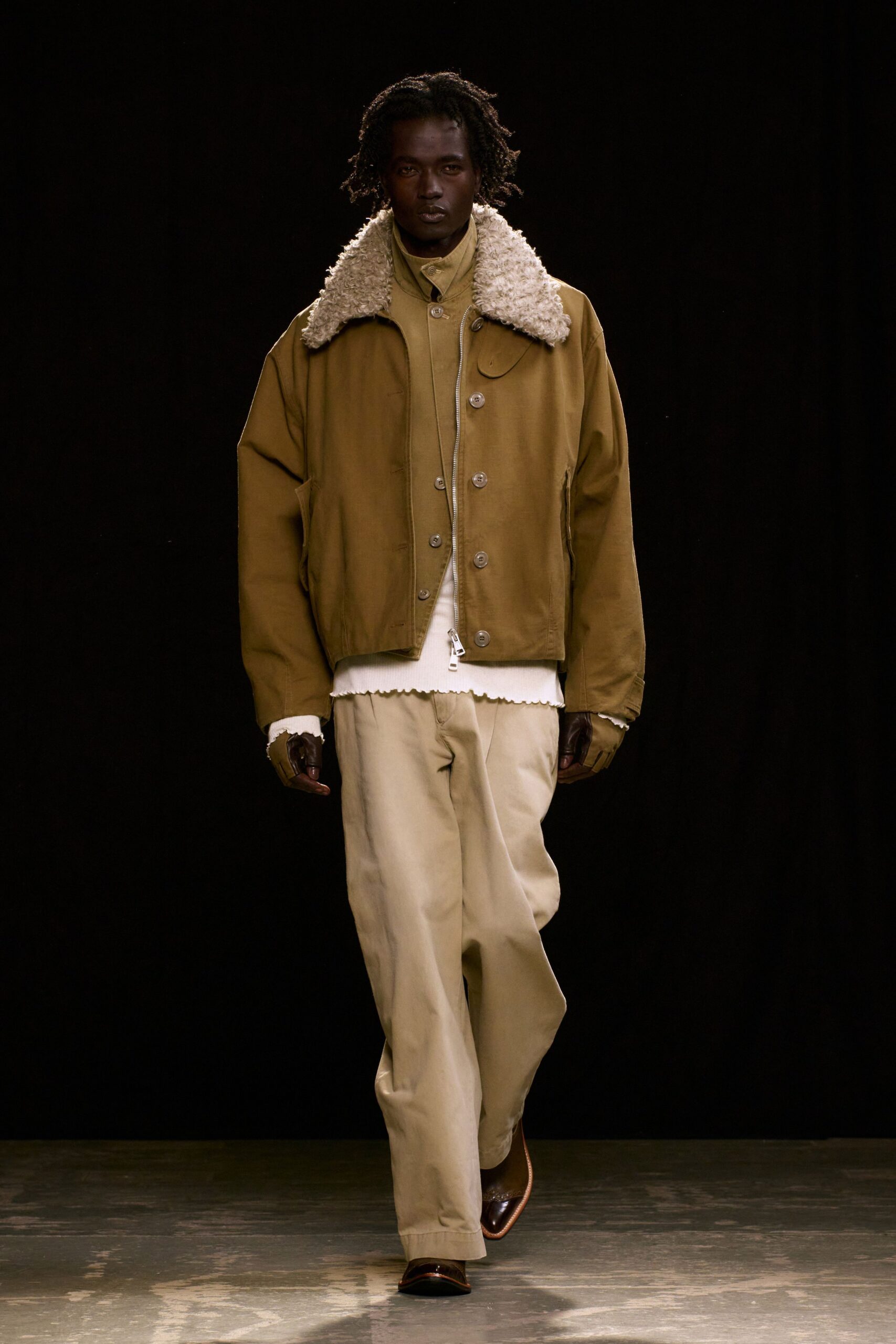 brown relaxed jacket with beige shirt and pants