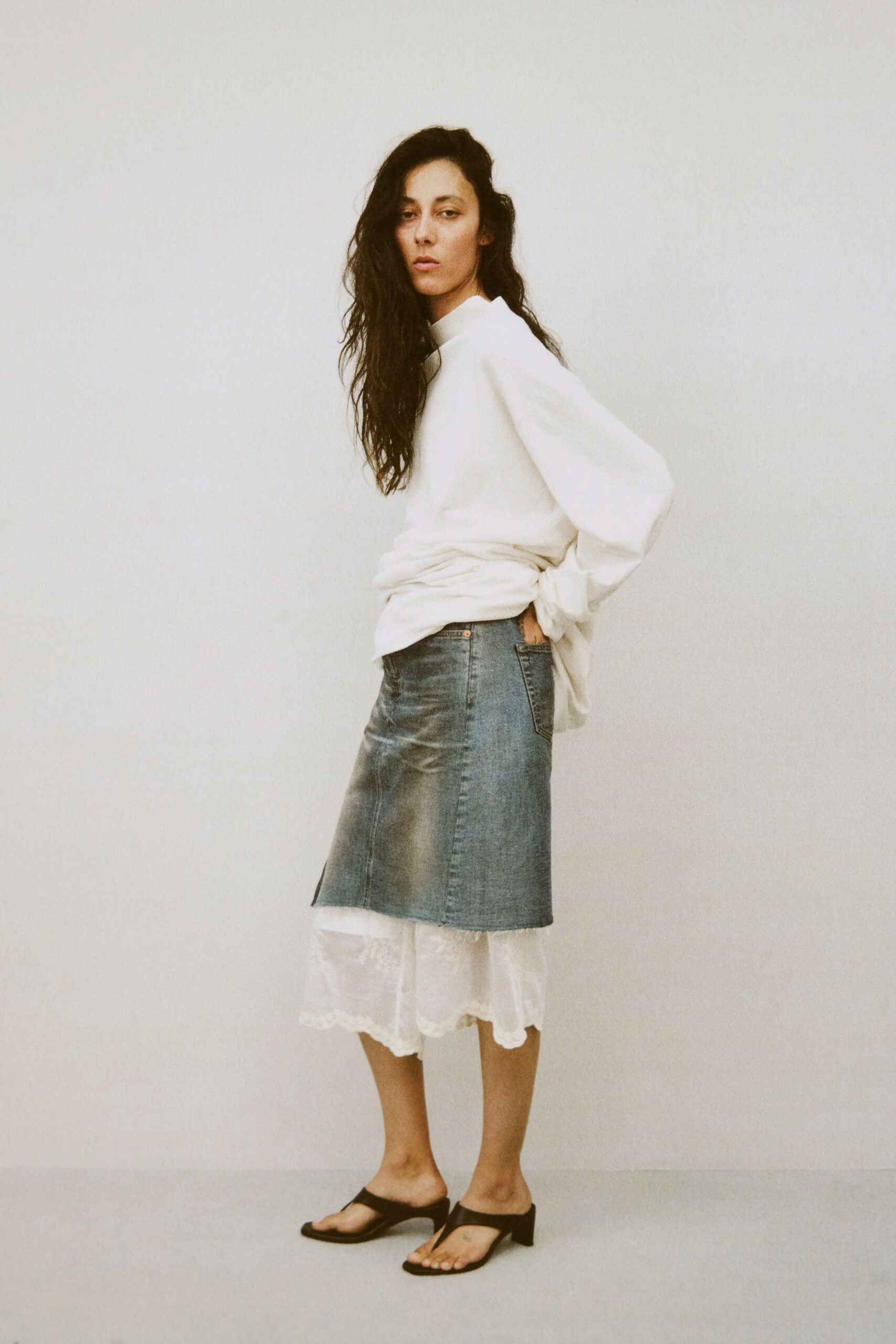 white relaxed top with denim skirt