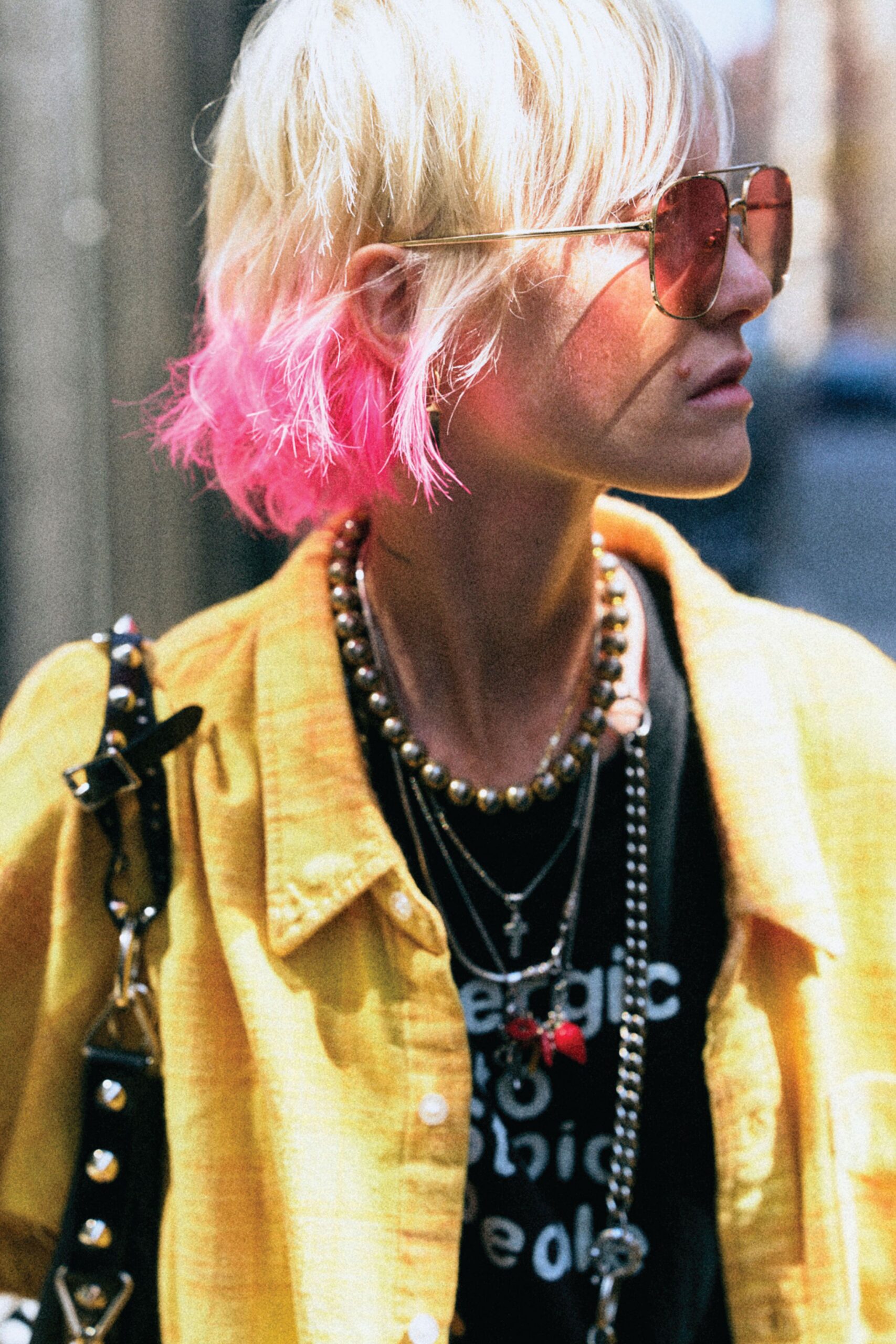 yellow shirt black t-shirt sunglasses