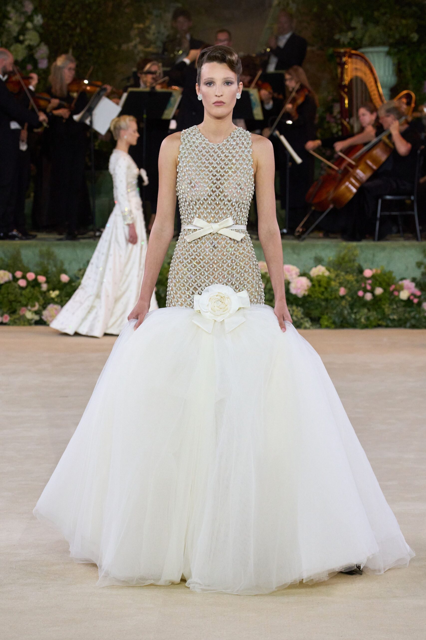 white tulle sleeveless gown