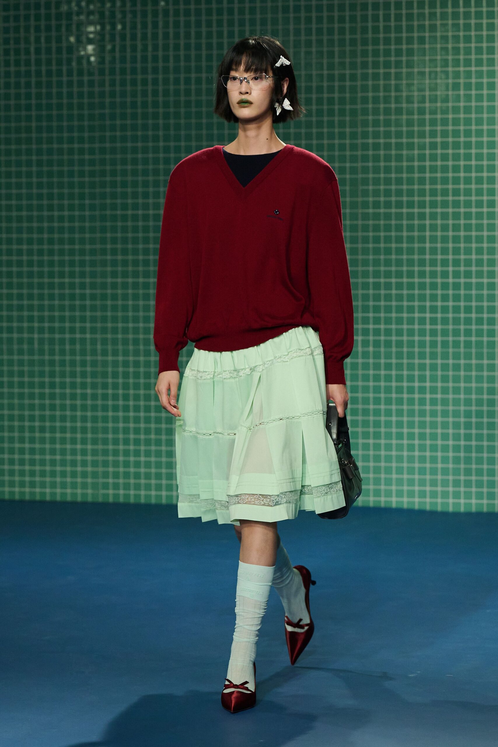 red sweater green midi skirt