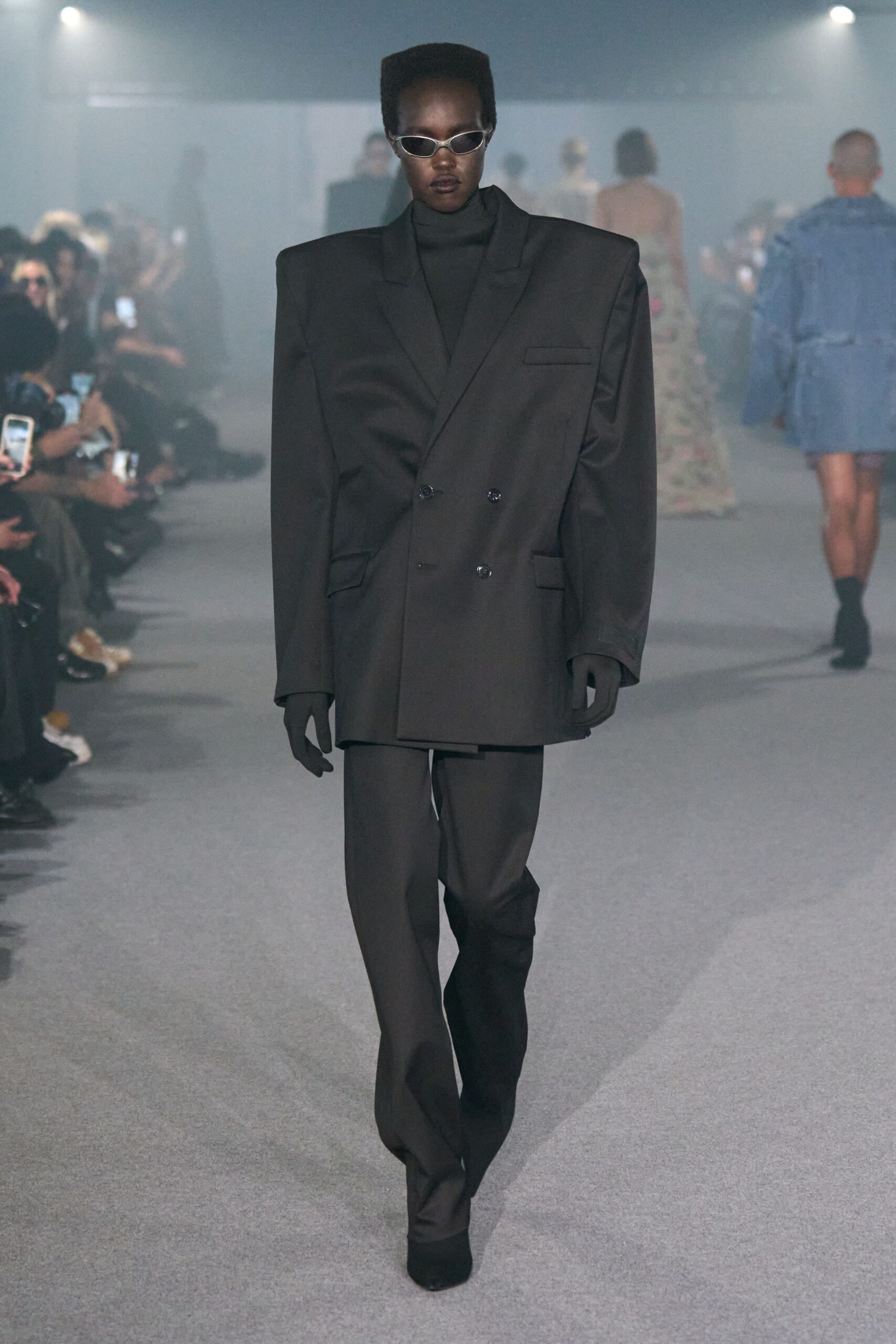 oversized black suit with sunglasses