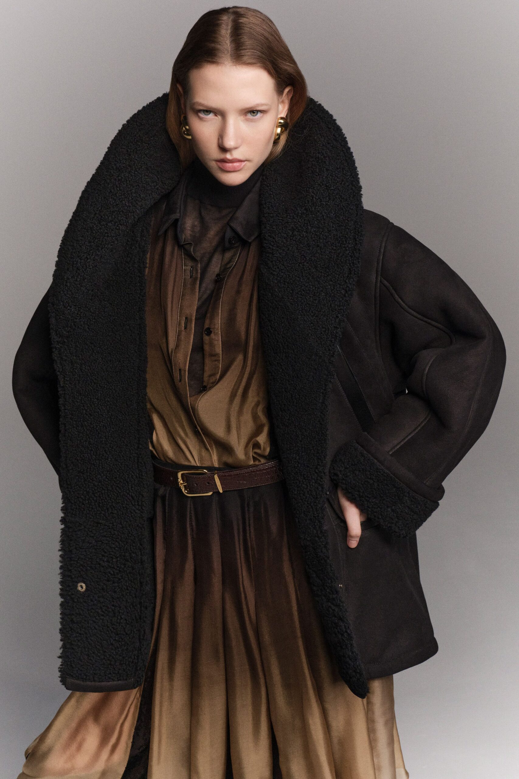 black oversized coat with brown dress