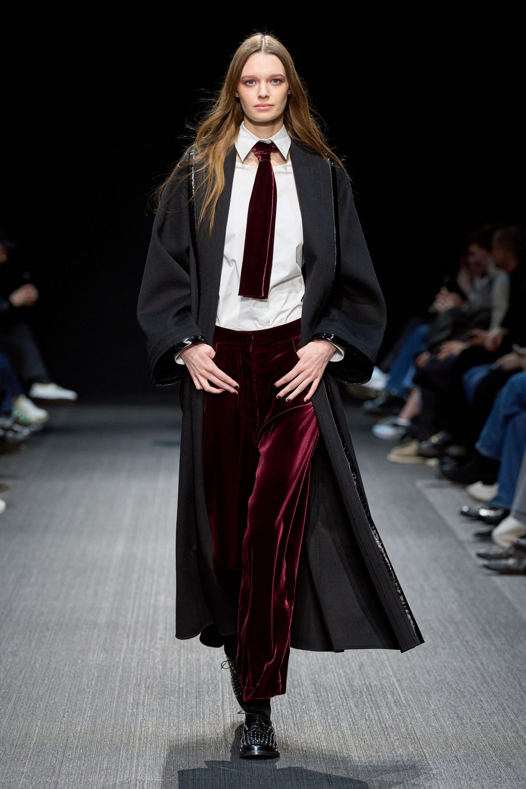 black coat with red pants