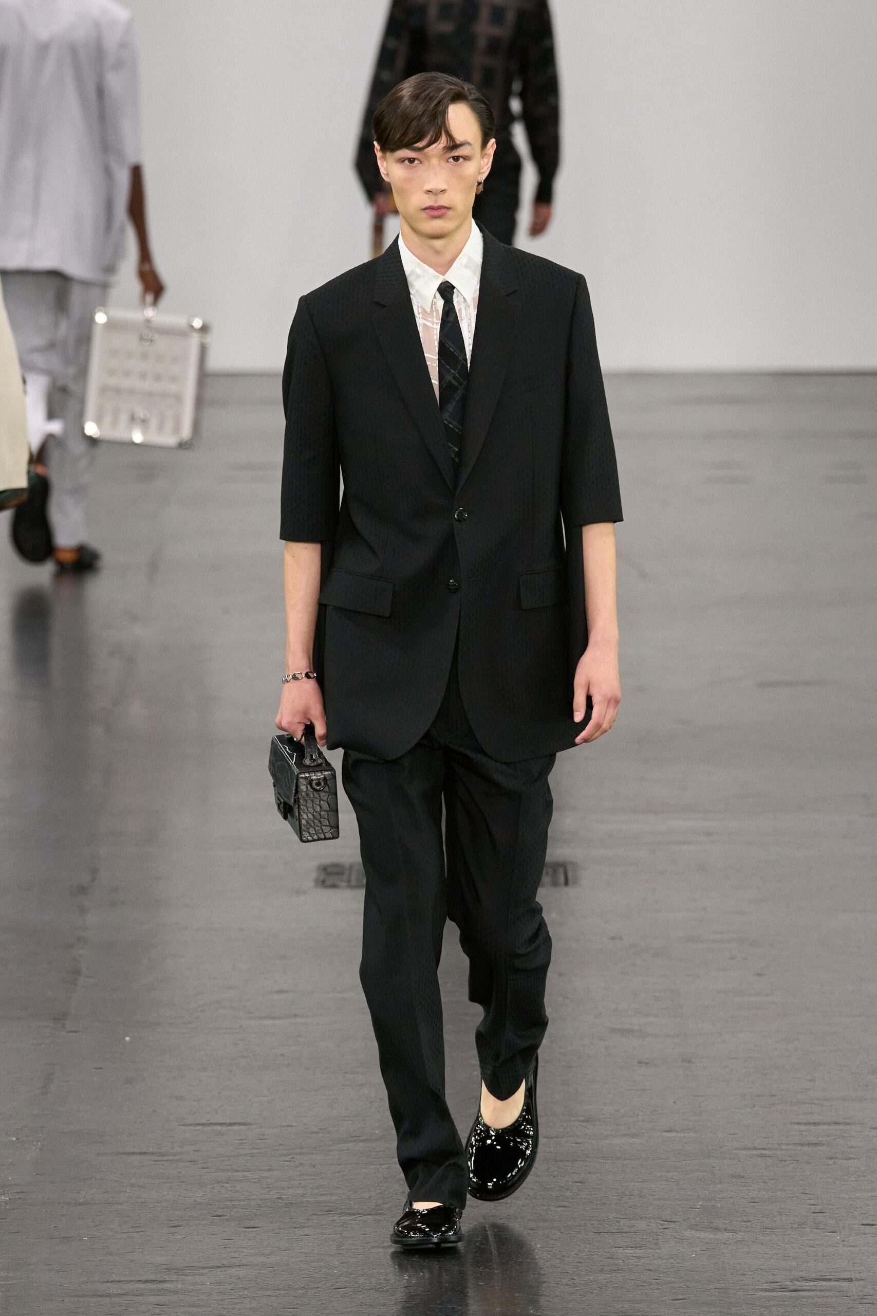 black tailored suit with shoes