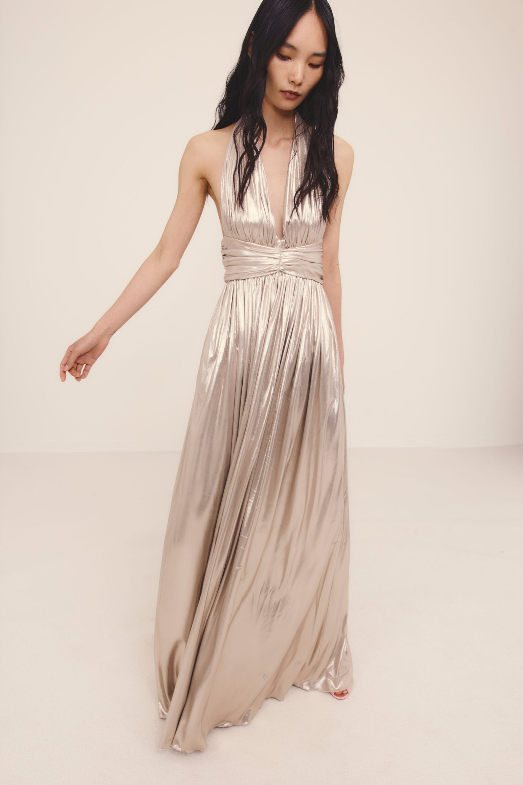 gold satin sleeveless gown