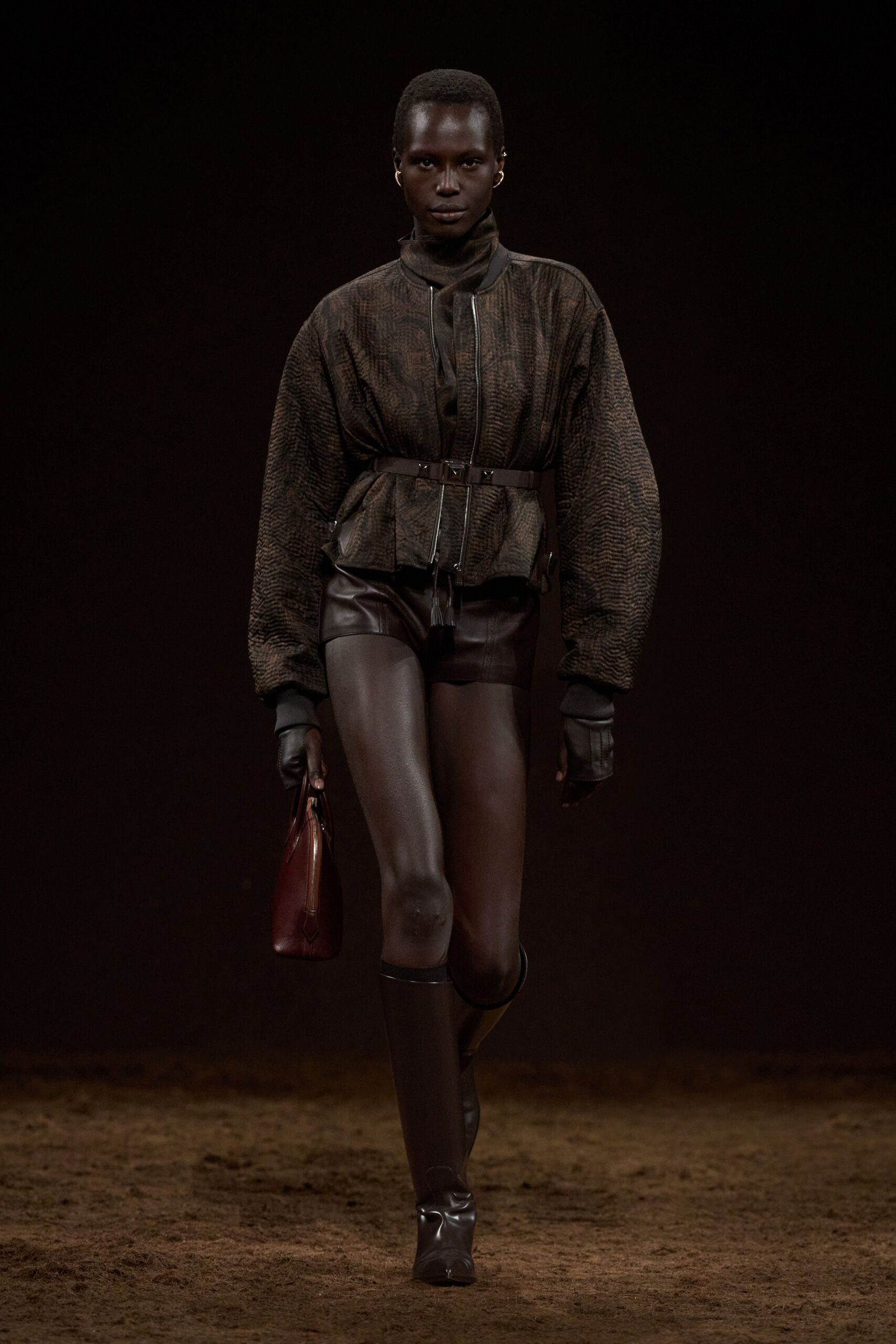 brown leather fitted jacket with black shorts