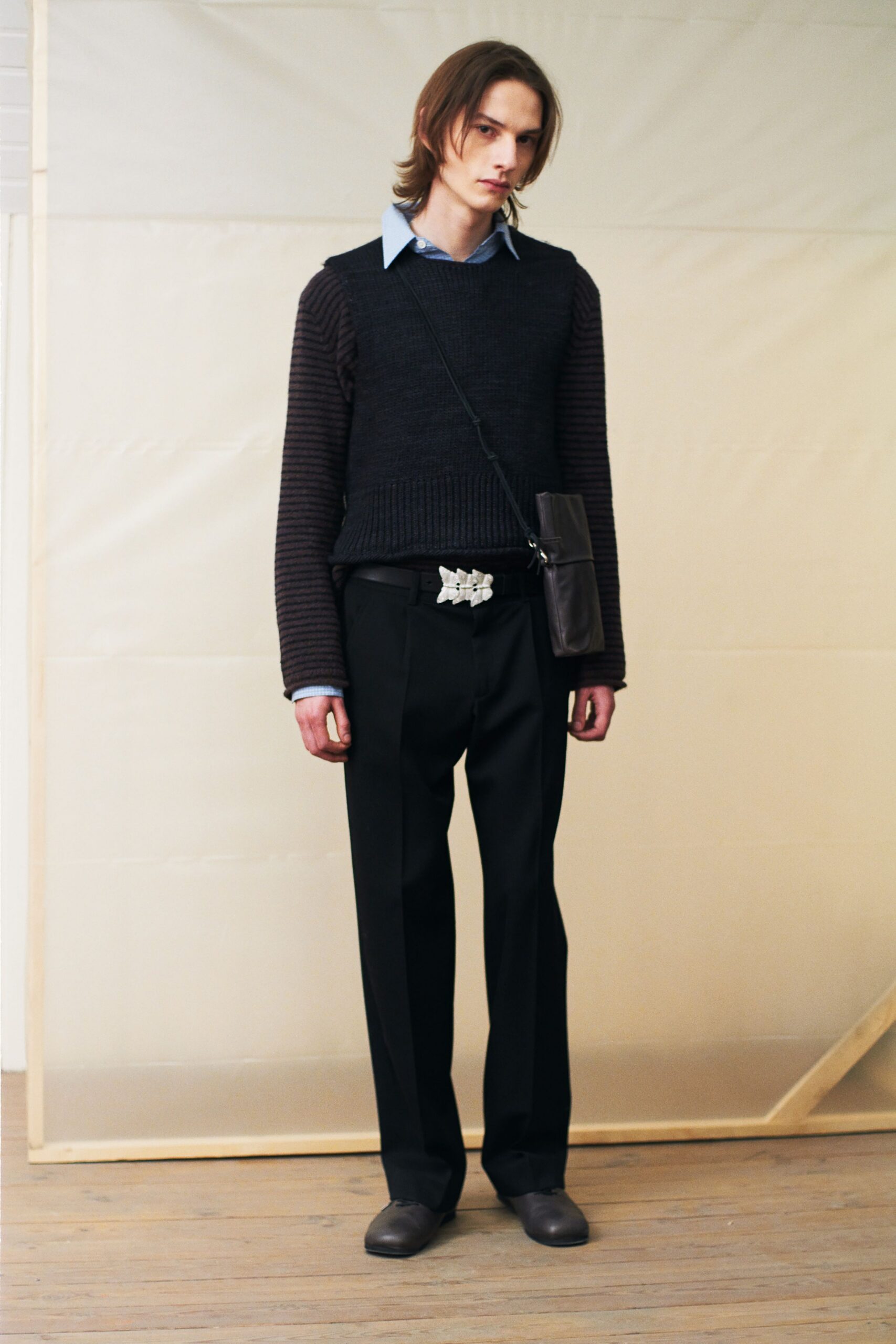 black wool relaxed sweater with blue shirt