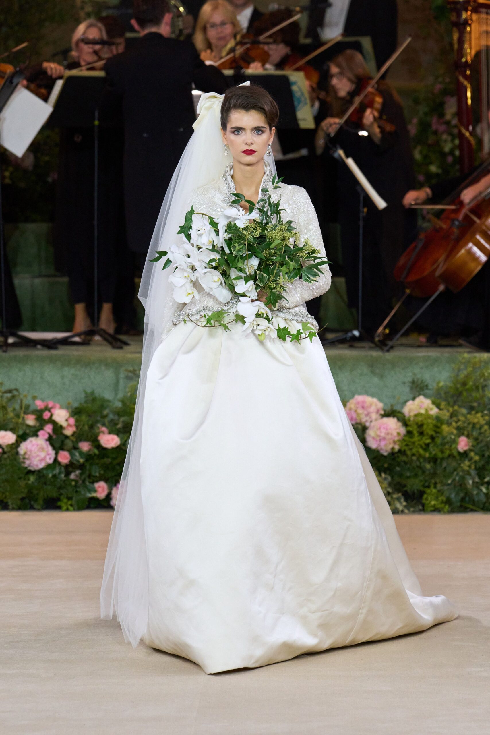 white silk fitted gown with veil