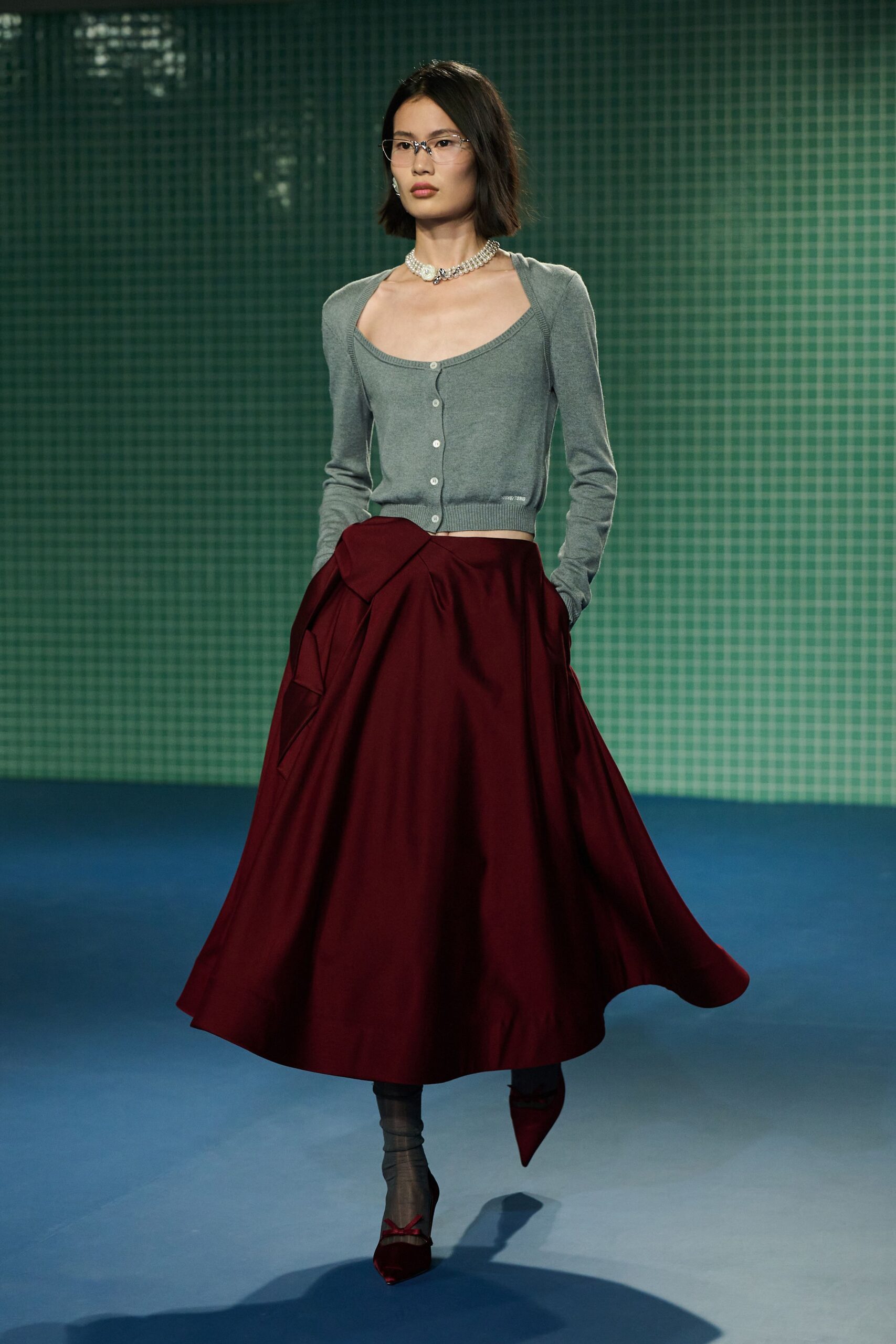 red silk relaxed pleated belted midi skirt