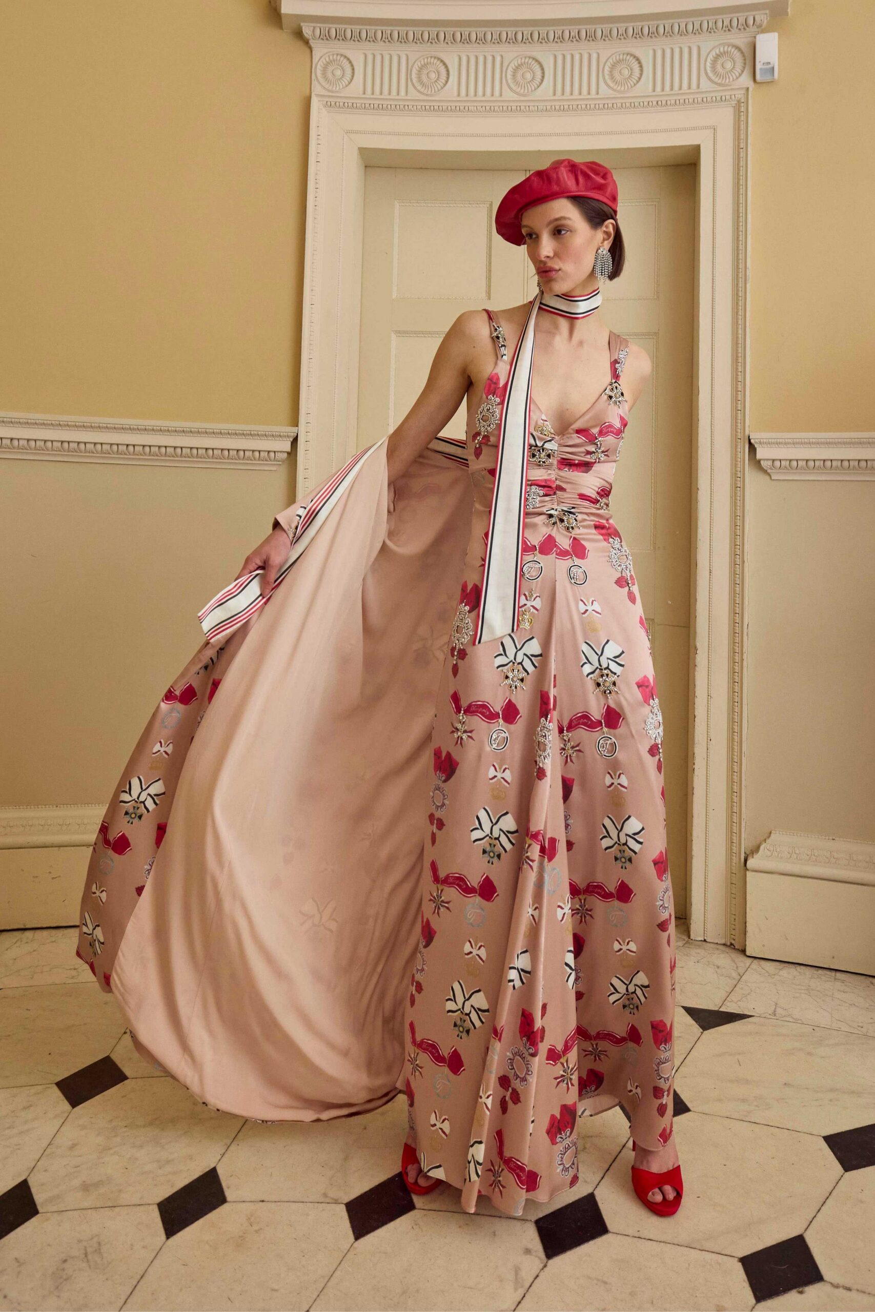 pink floral gown with red accessories