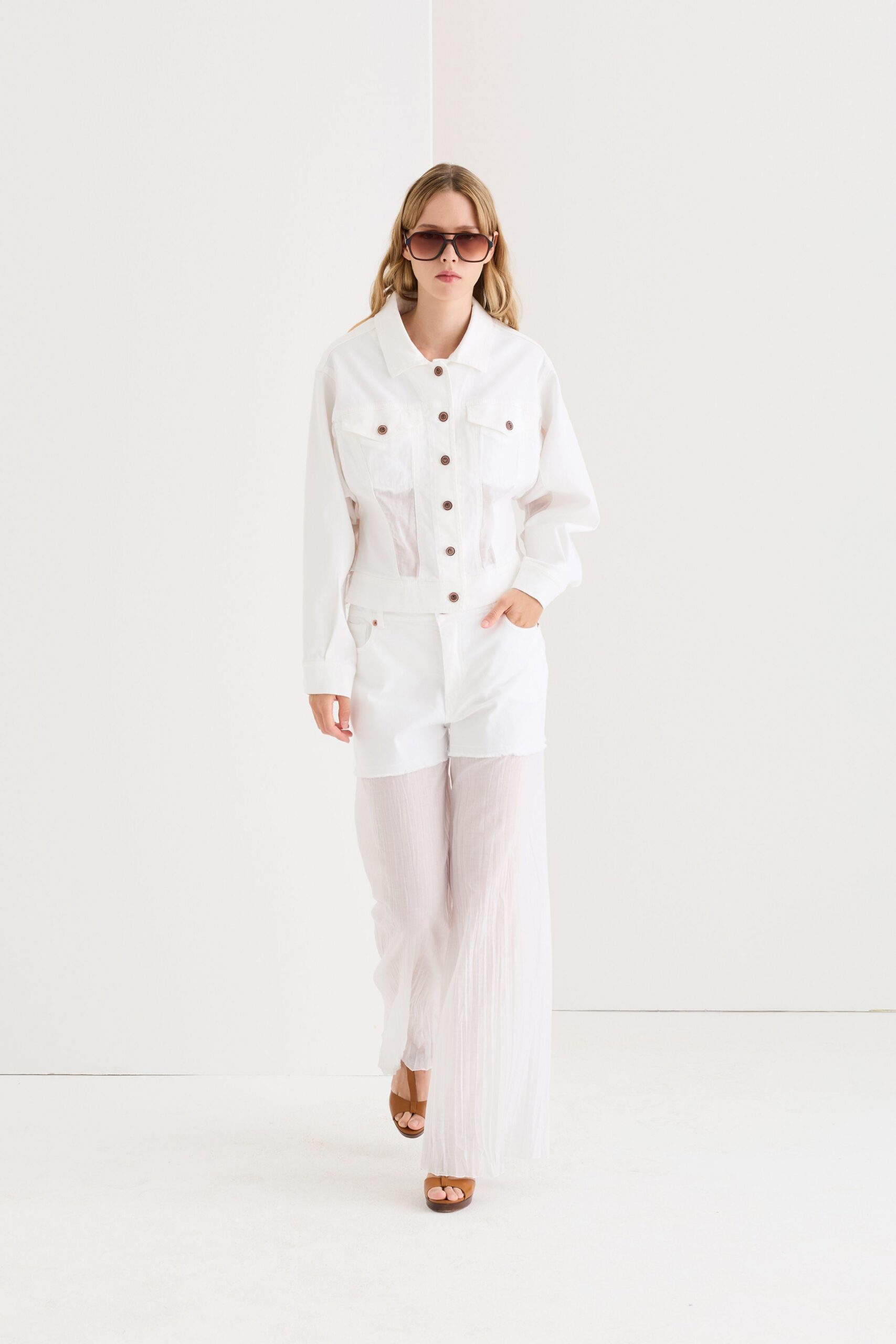 white relaxed jacket with pleated pants