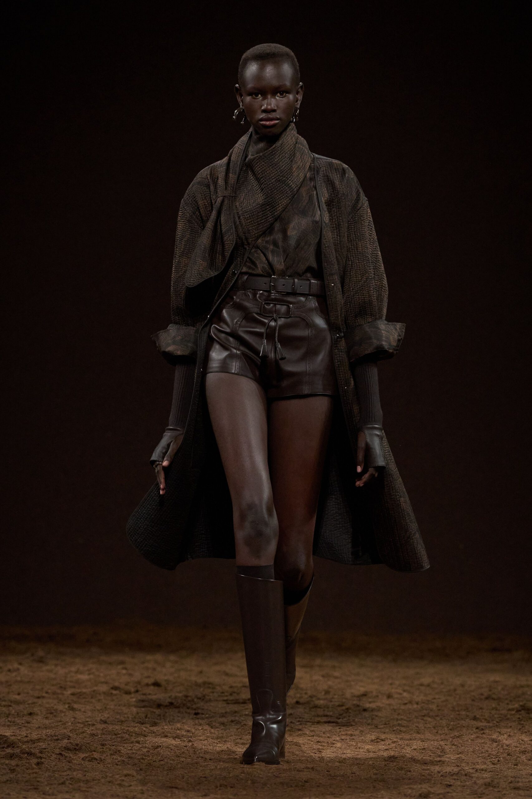 black wool coat with leather shorts