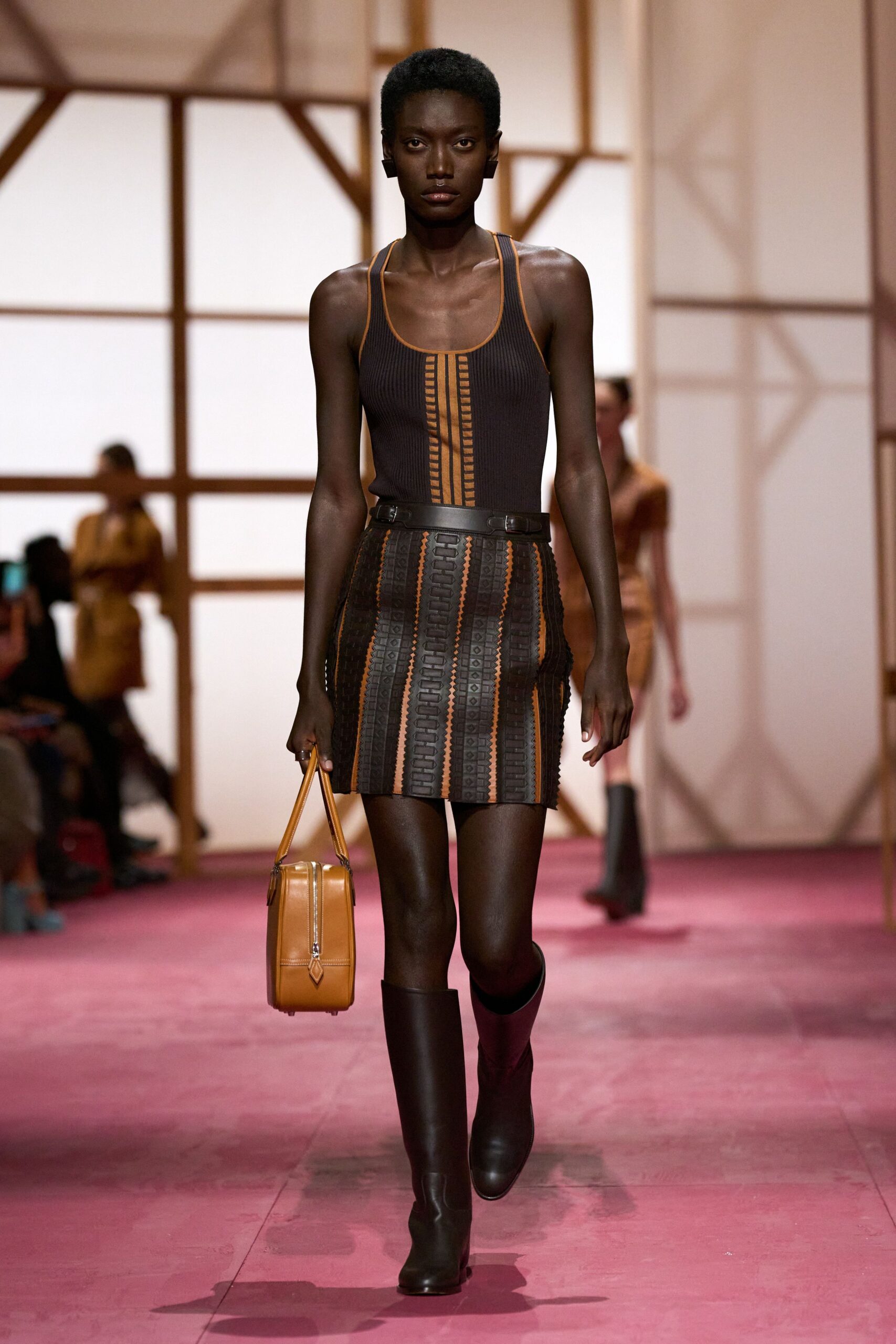 brown fitted top and mini skirt
