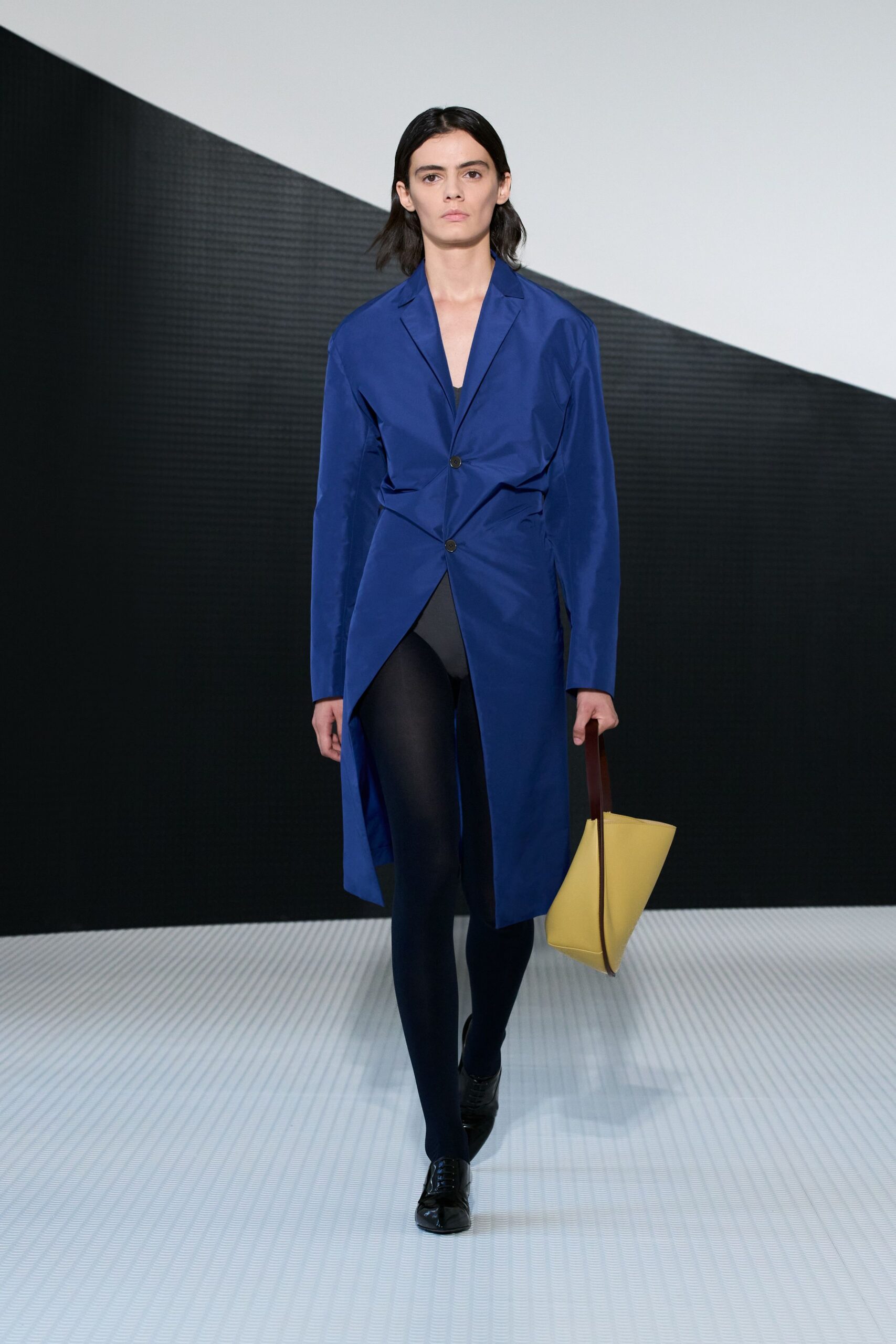 blue cotton long-sleeve collared structured buttoned midi coat