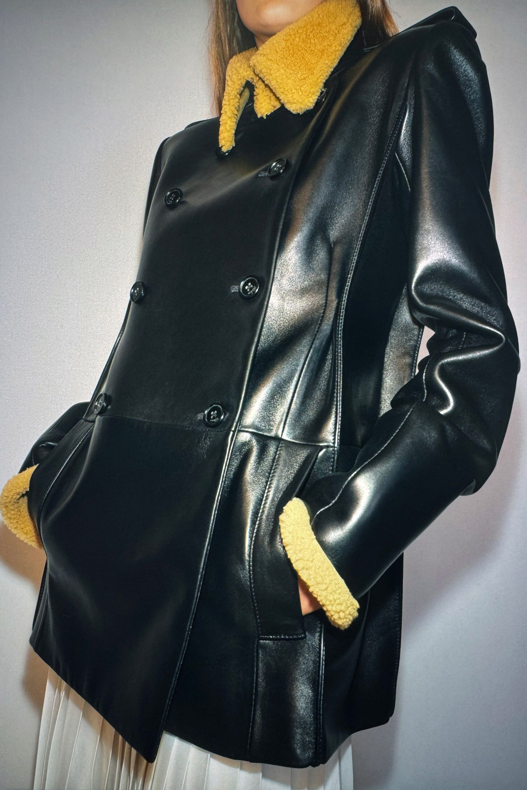 black leather coat with yellow collar