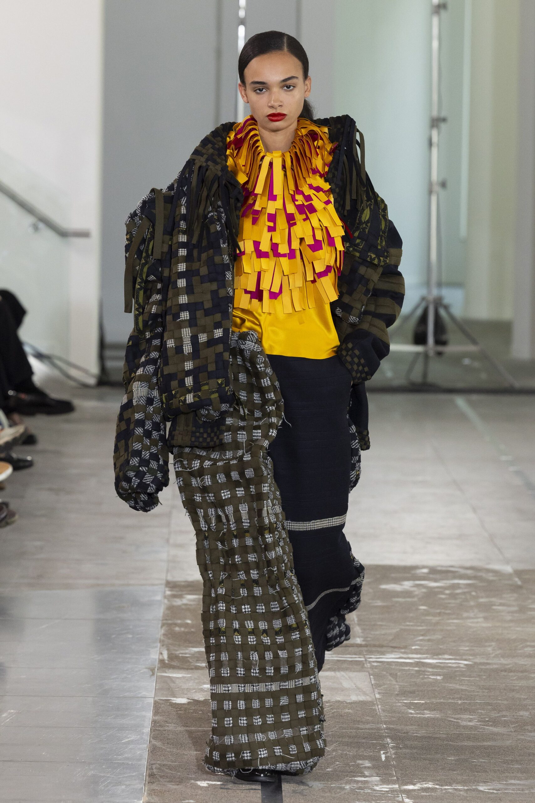 yellow ruffled top with oversized coat