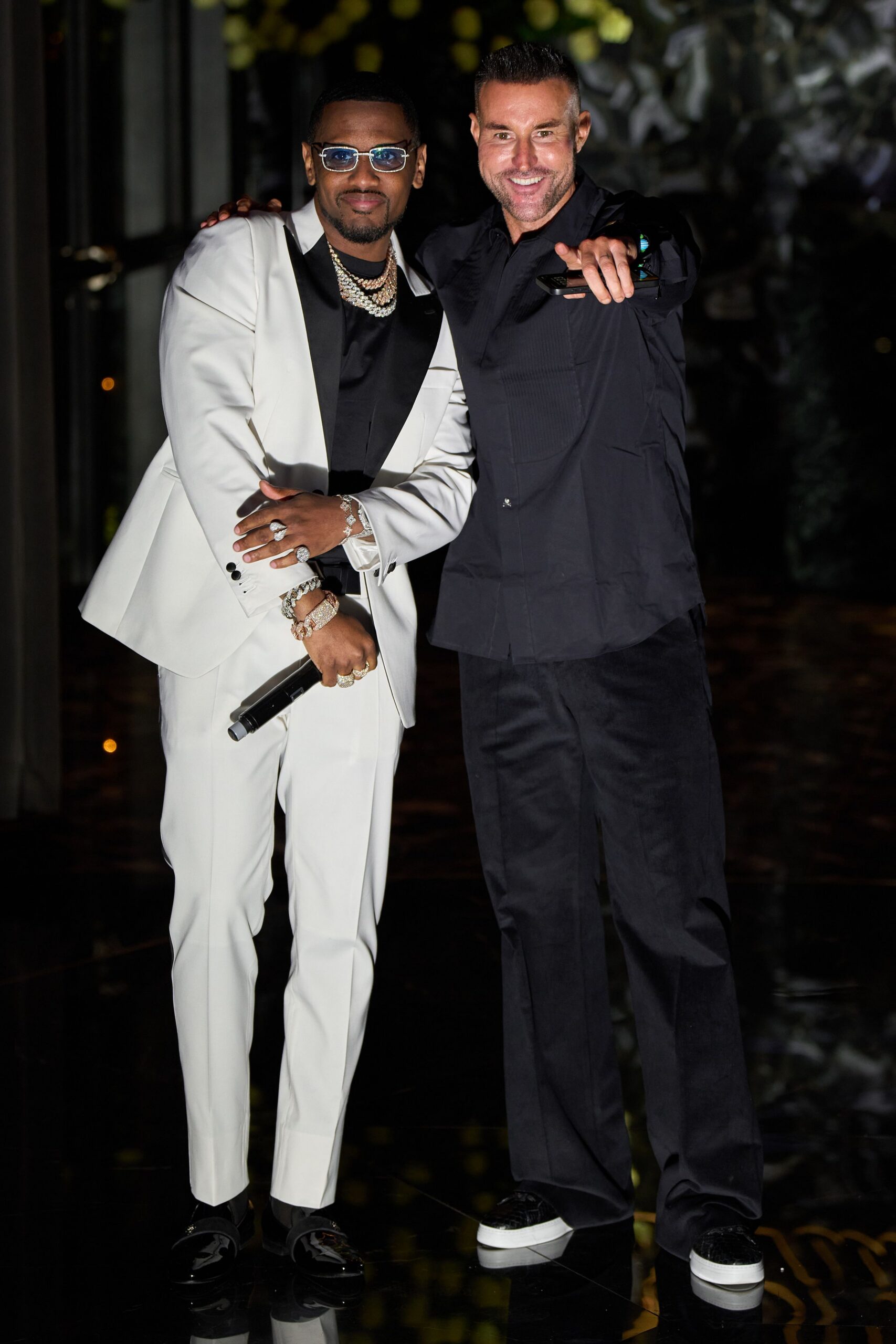 white tailored suit with black shirt