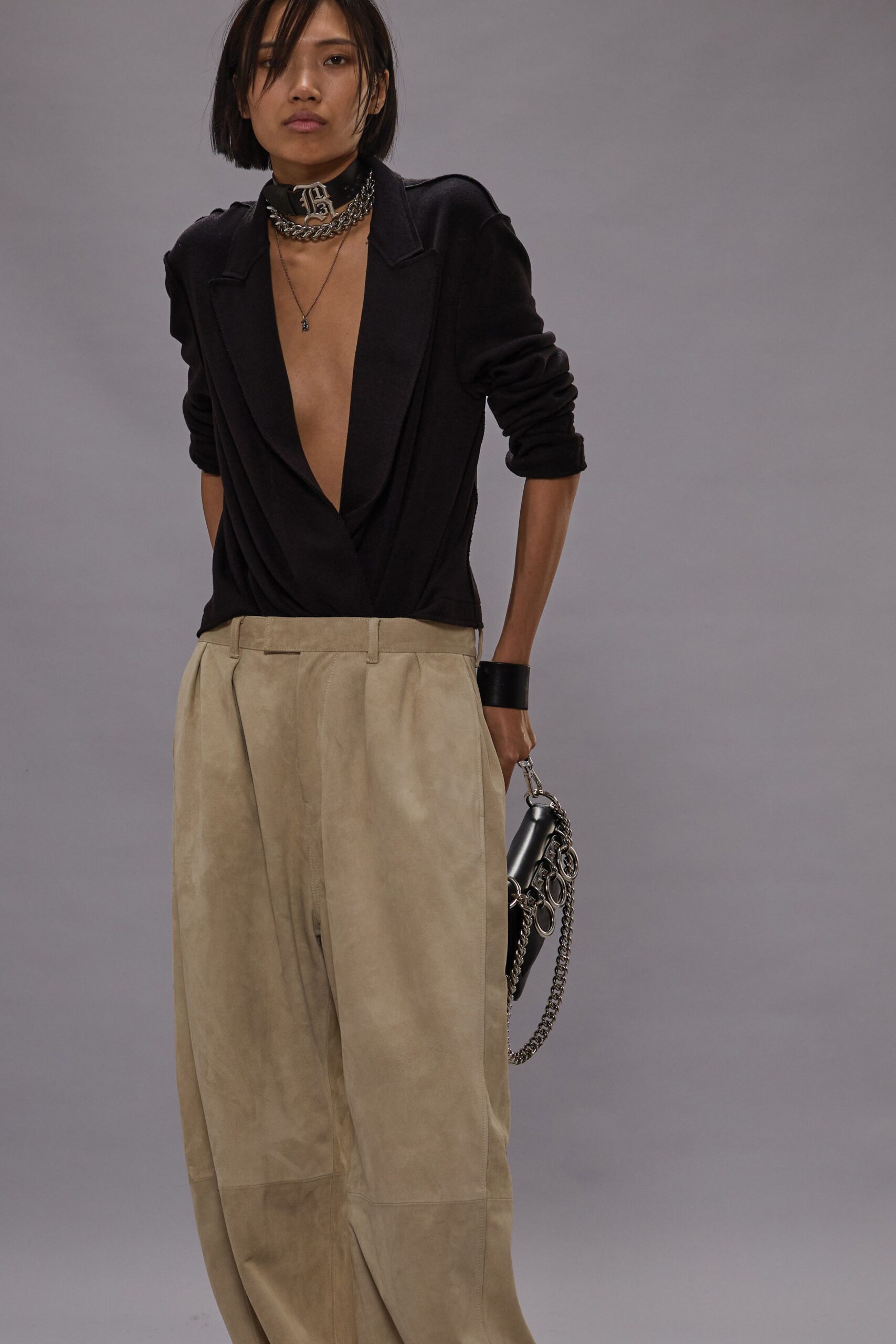black blazer beige wide-leg pants