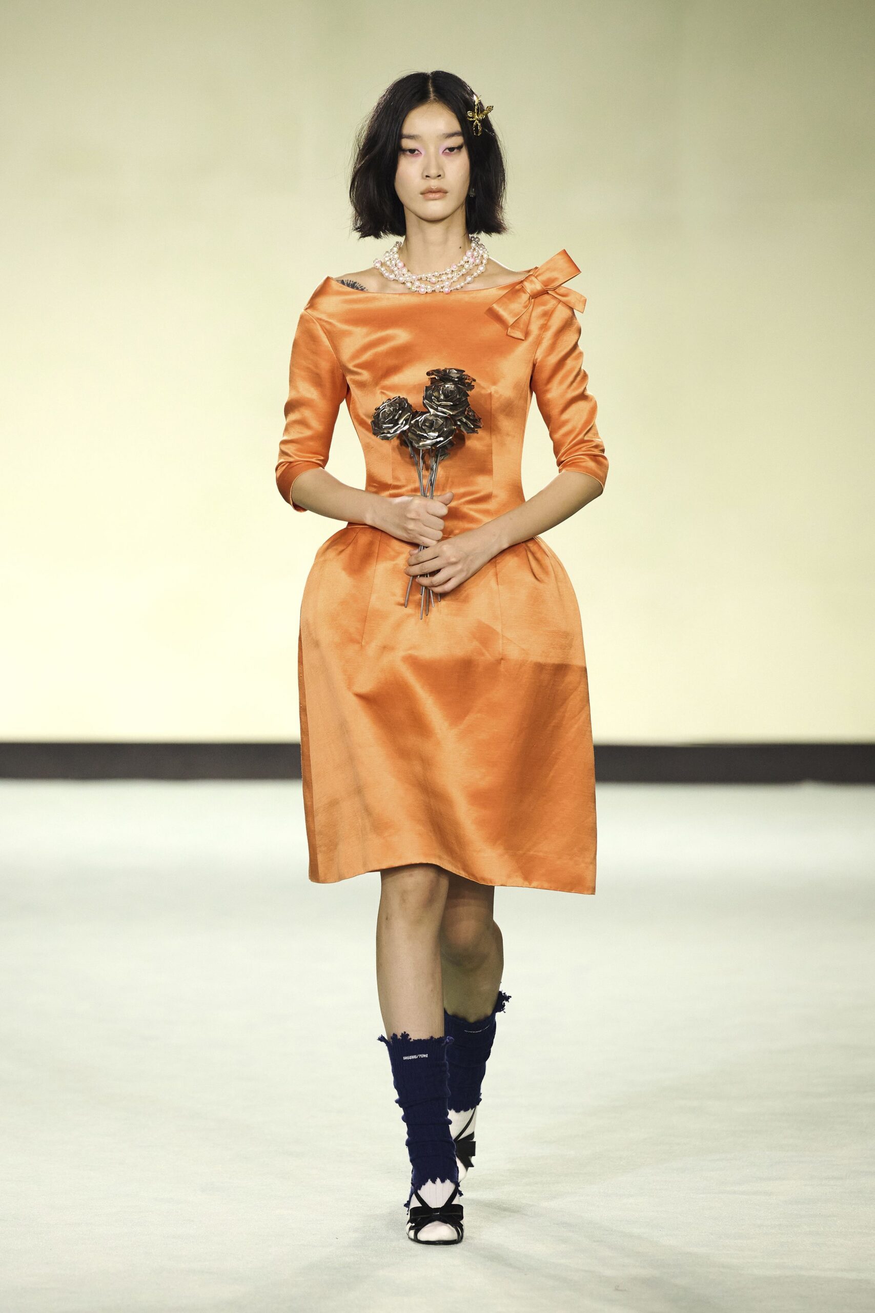 orange silk long-sleeve off-shoulder fitted pleated mini dress