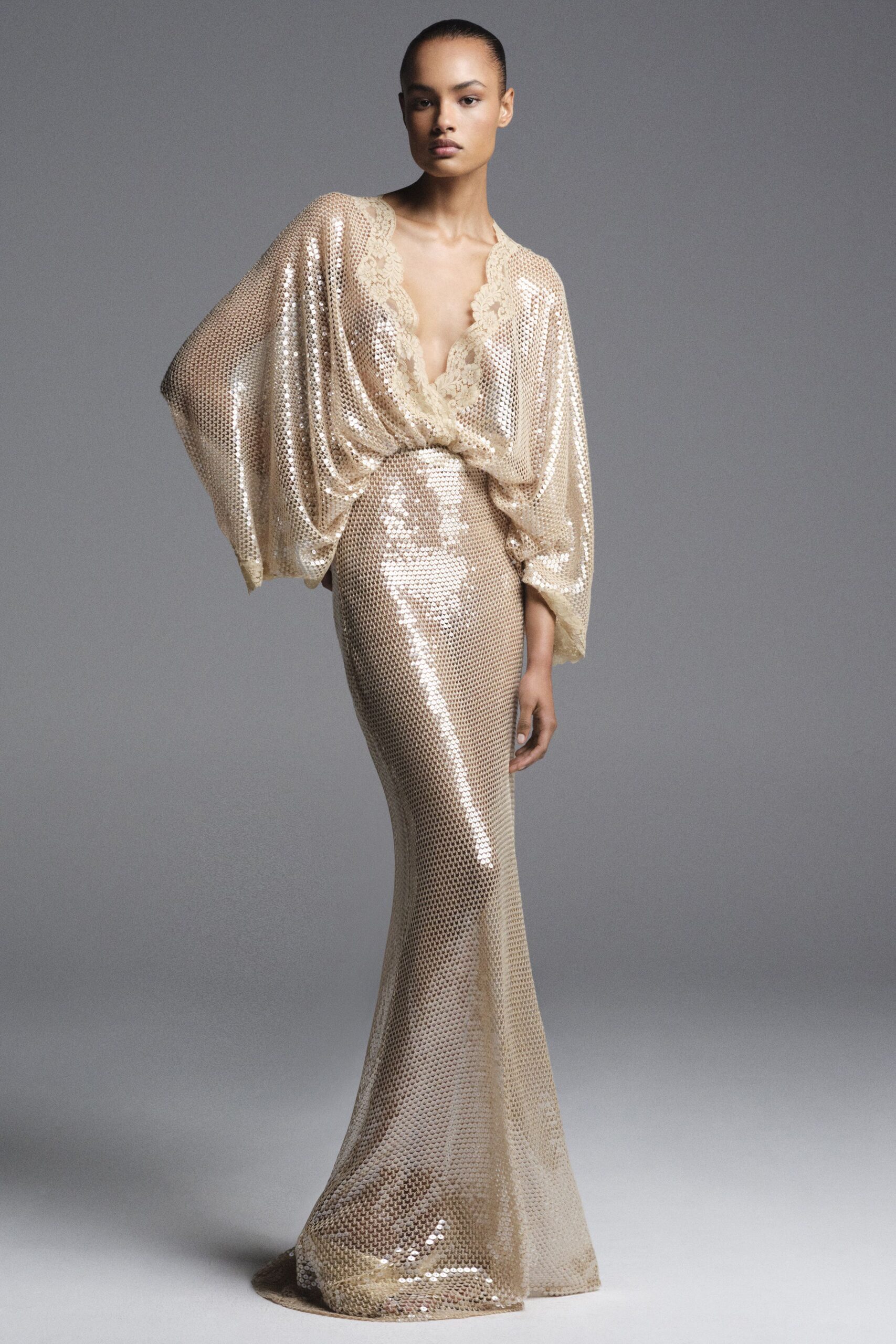 gold sequin sleeveless gown