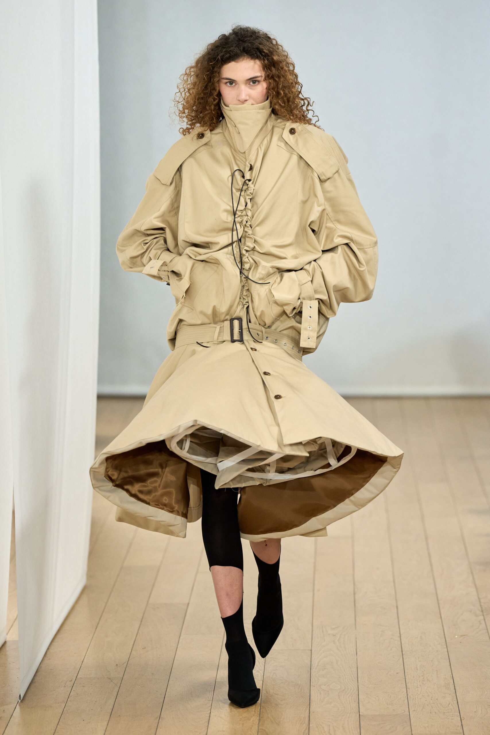 beige oversized coat with fitted dress
