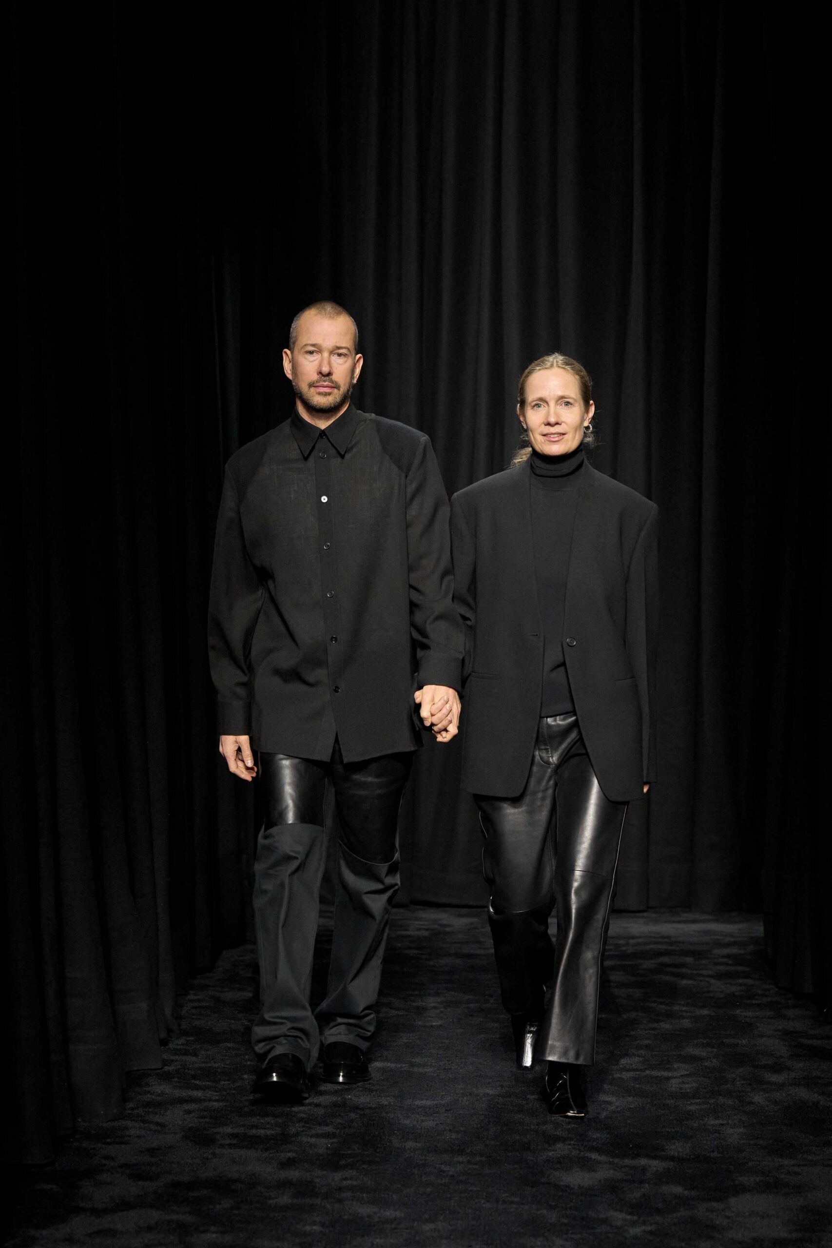 black shirt blazer leather pants