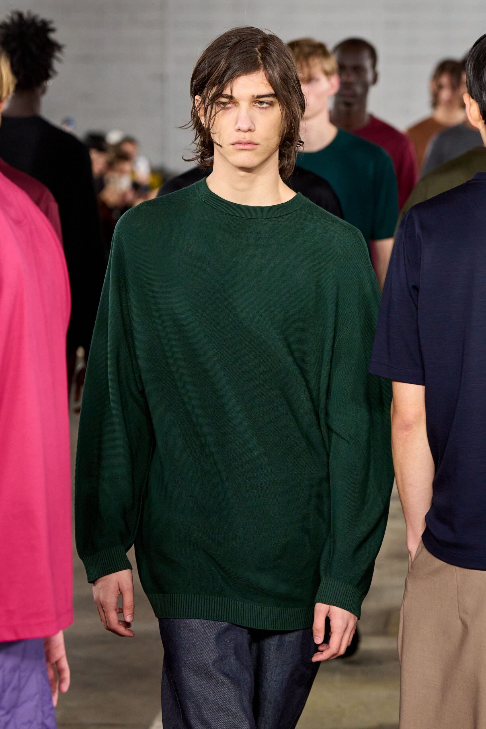 oversized green sweater with relaxed blue pants